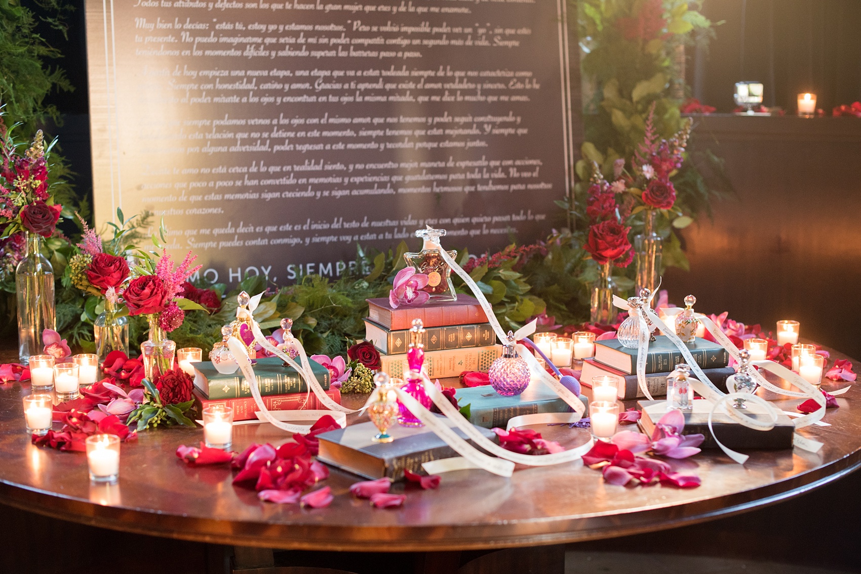 Mikkel Paige Photography photos of a NYC proposal at The Nomad Hotel. The groom wrote a message in Spanish to present to his new fiancee with various vintage perfume bottles and ribbons with black hand calligraphy on them with special detailed messages.