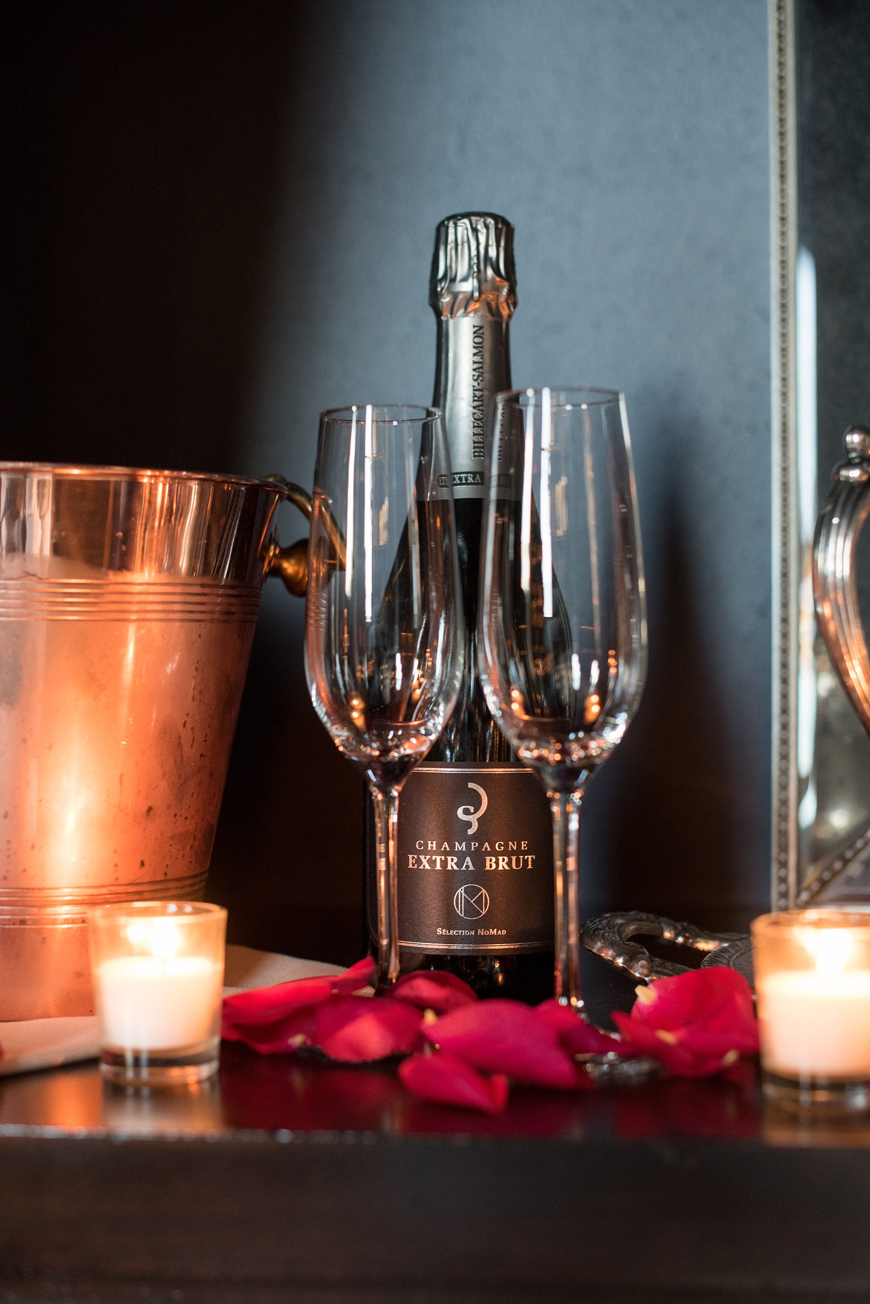 Mikkel Paige Photography photos of a surprise romantic NYC proposal at The Nomad Hotel with champagne ready to celebrate.