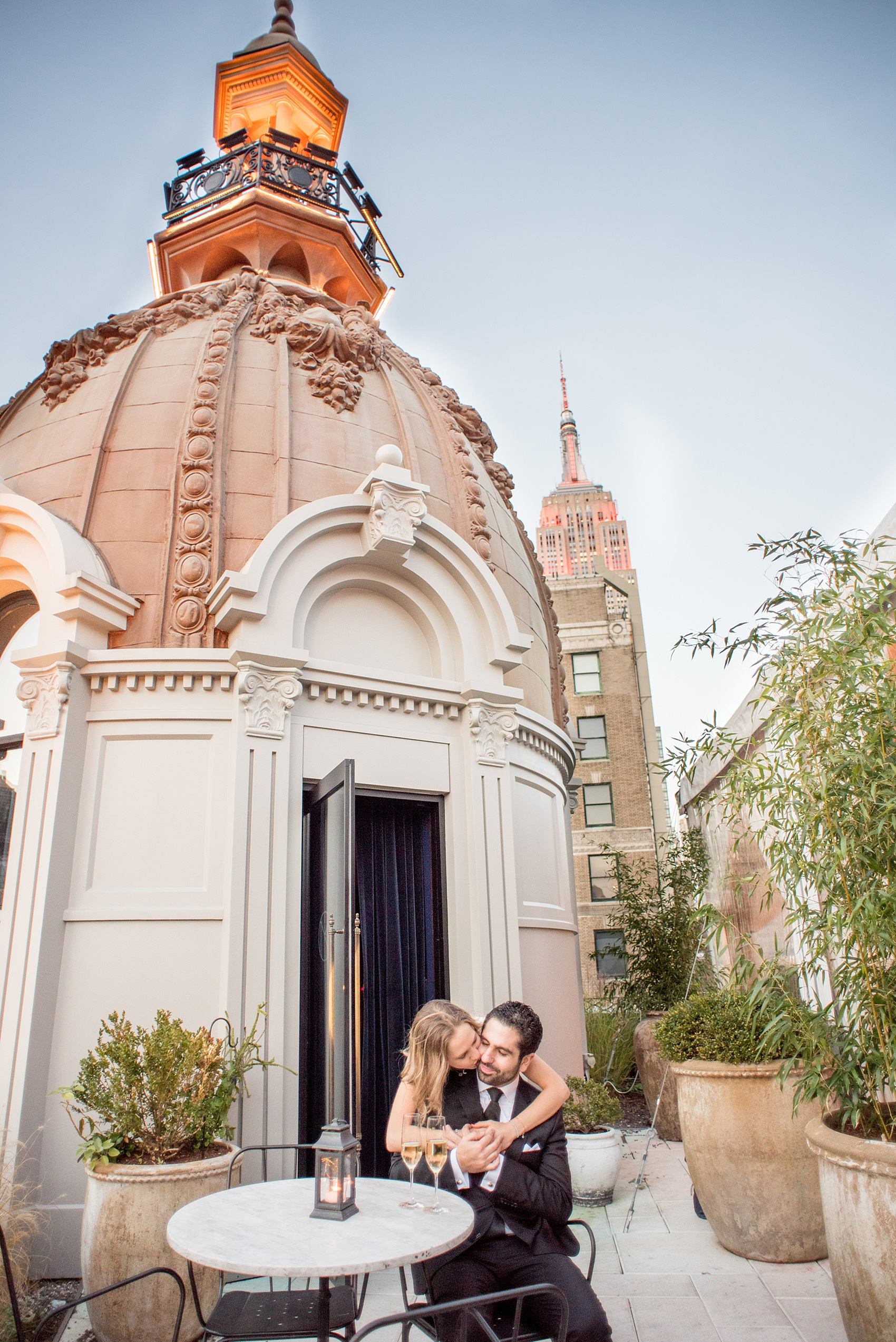 Mikkel Paige Photography photos of a surprise romantic NYC proposal at The Nomad Hotel. Rooftop photos of the newly engaged couple!