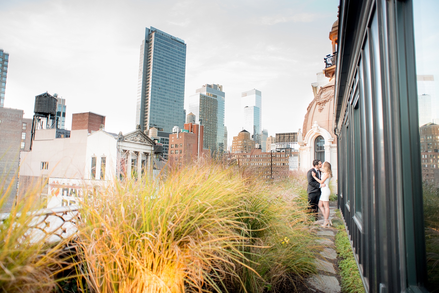 Mikkel Paige Photography photos of a surprise romantic NYC proposal at The Nomad Hotel. Rooftop photos of the newly engaged couple!