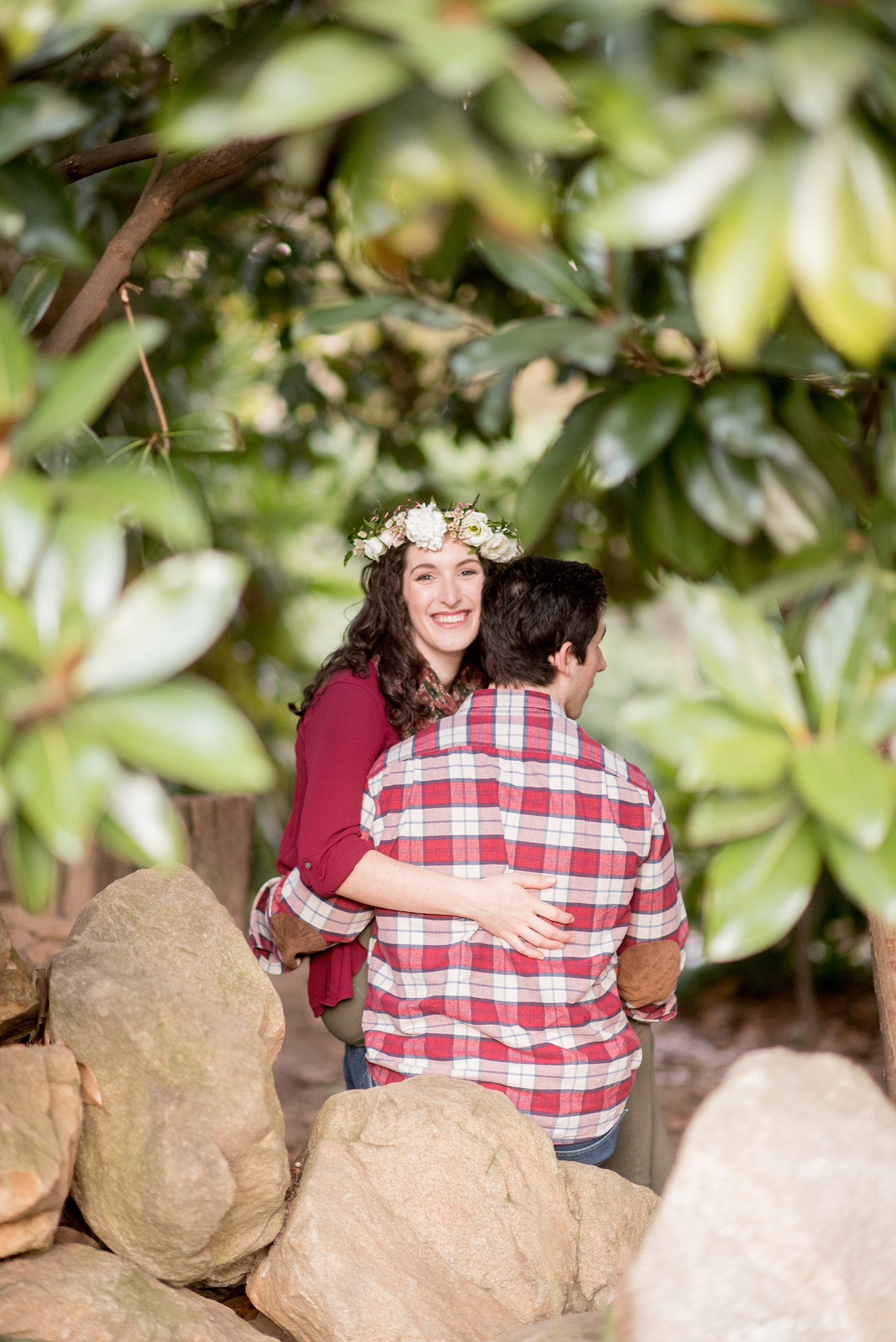 Mikkel Paige Photography images of a Raleigh engagement session at Pullen Park with a white floral crown.