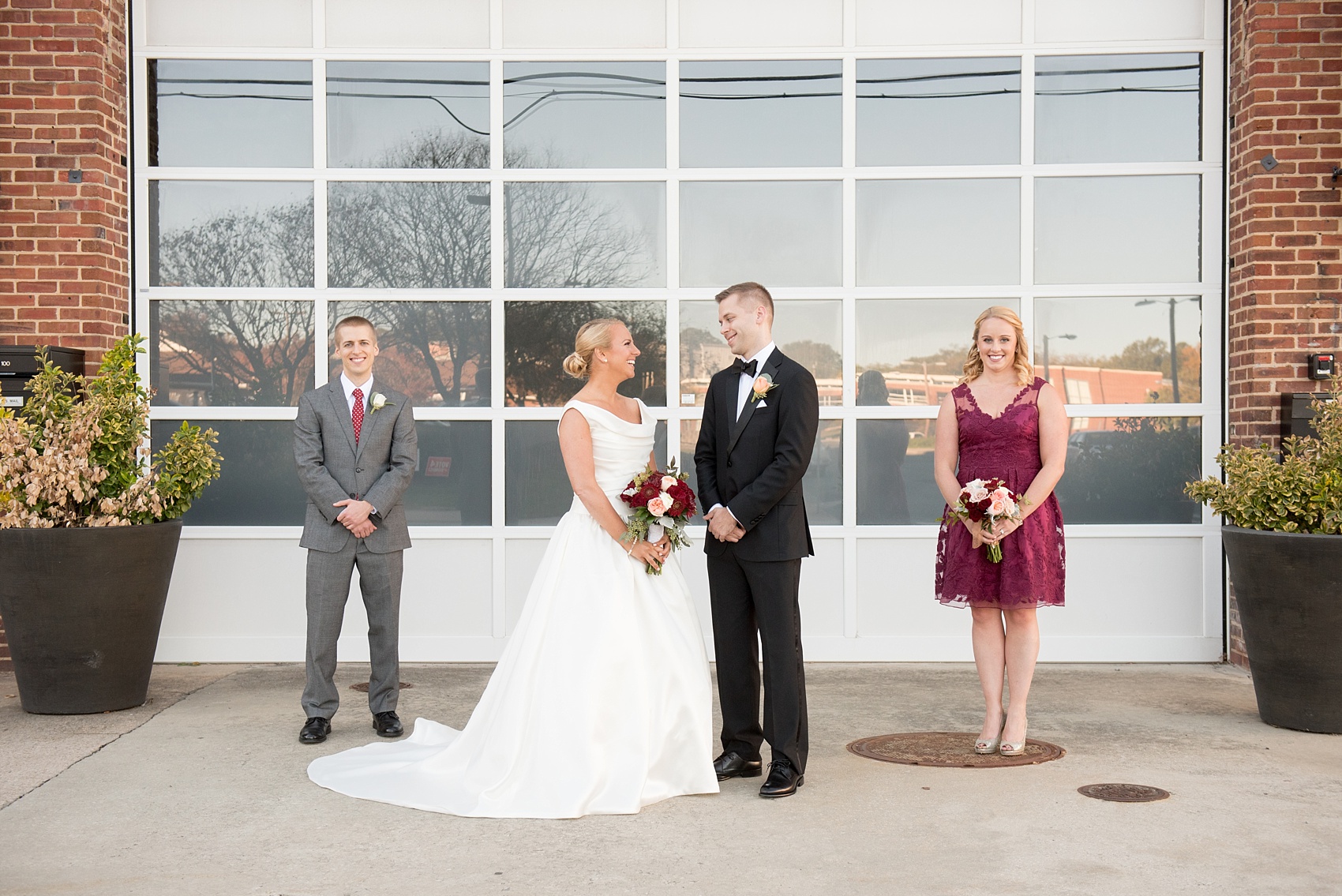 Mikkel Paige Photography photo of a wedding at The Rickhouse, Durham. A unique photo for a fall day with a small wedding party and autumn color palette.