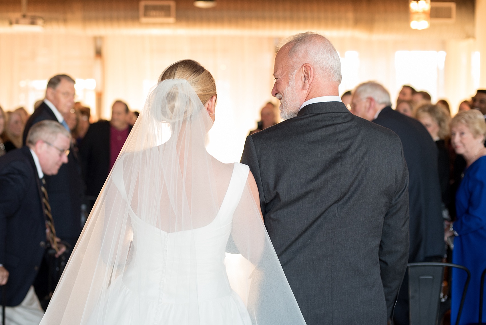 Mikkel Paige Photography photo of a wedding at The Rickhouse, Durham. A picture of the bride and her father sharing a special moment before walking down the aisle.