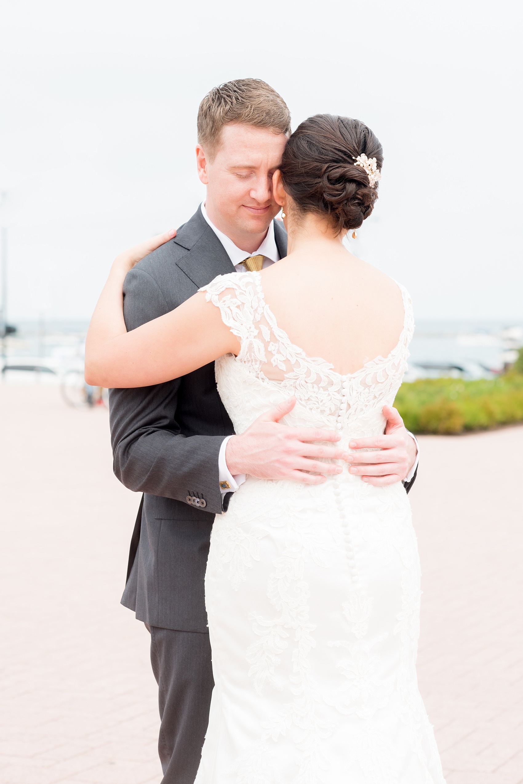 Mikkel Paige Photography photos of a wedding in downtown Chicago at The Rookery. The bride and groom took photos by the waterfront and riverwalk.