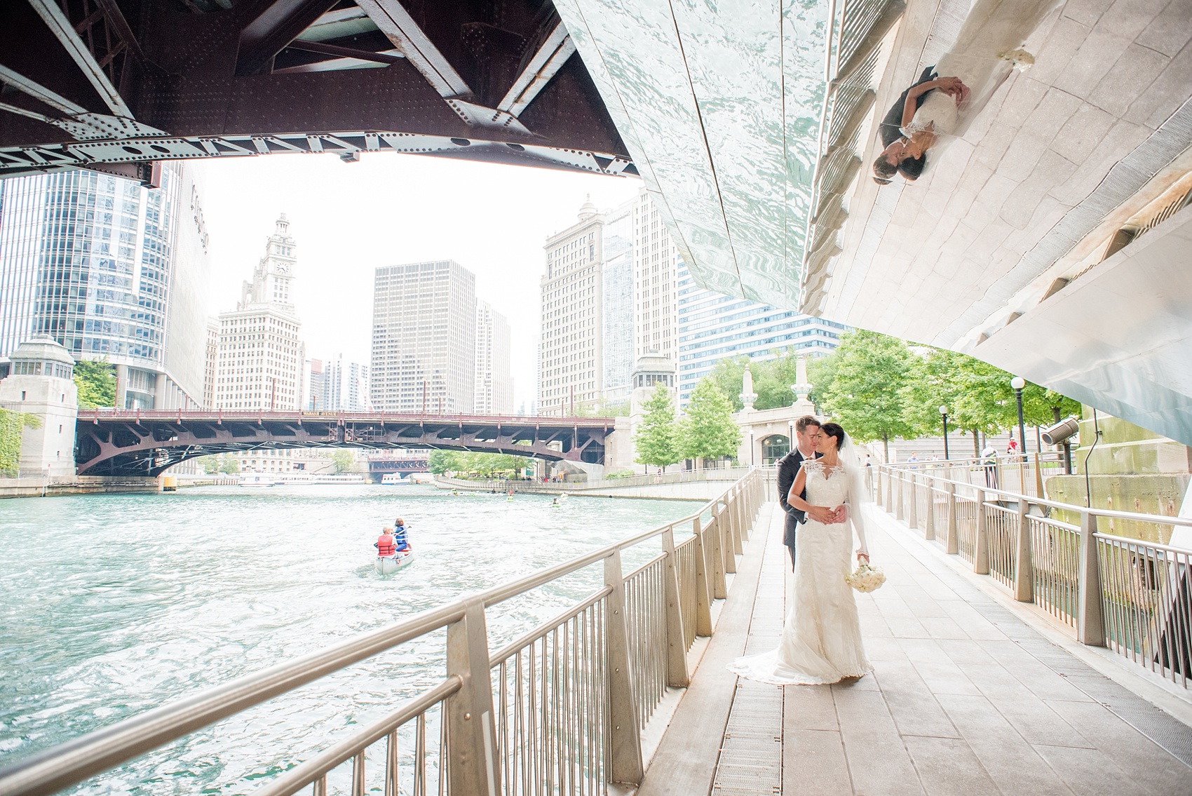 Mikkel Paige Photography photos of a wedding in downtown Chicago at The Rookery. The bride and groom took photos by the waterfront and Riverwalk.