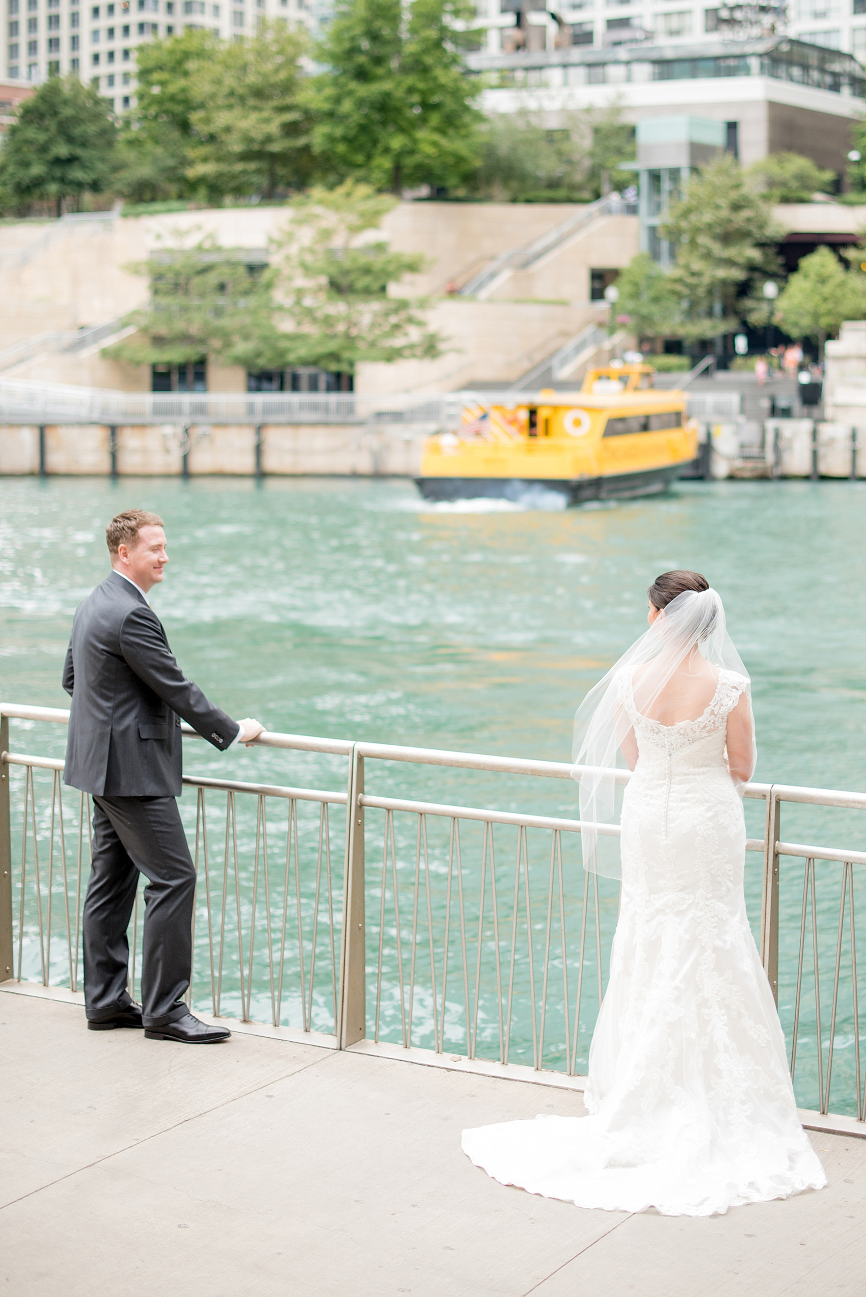 Mikkel Paige Photography photos of a wedding in downtown Chicago at The Rookery. The bride and groom took photos by the waterfront and Riverwalk.