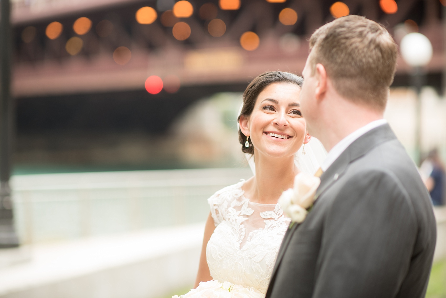 Mikkel Paige Photography photos of a wedding in downtown Chicago at The Rookery. The bride and groom took photos by the waterfront and Riverwalk.