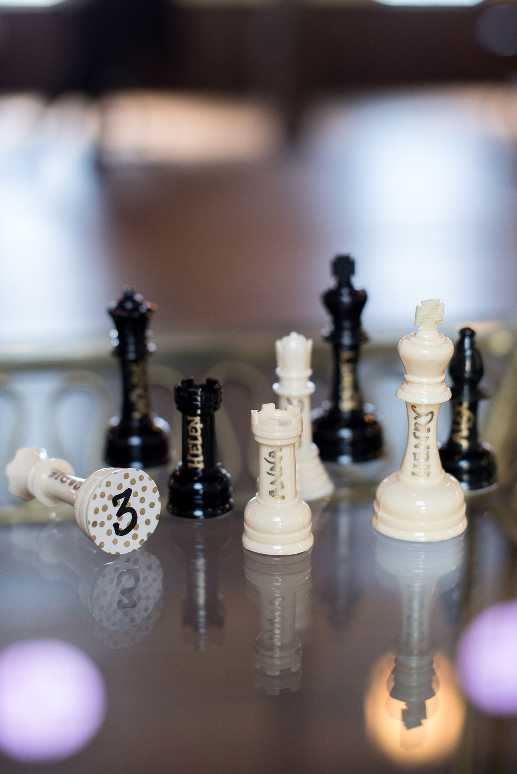 Mikkel Paige Photography pictures of a Raleigh, NC wedding at All Saints Chapel. Gay inspiration with masculine chess piece escort cards.