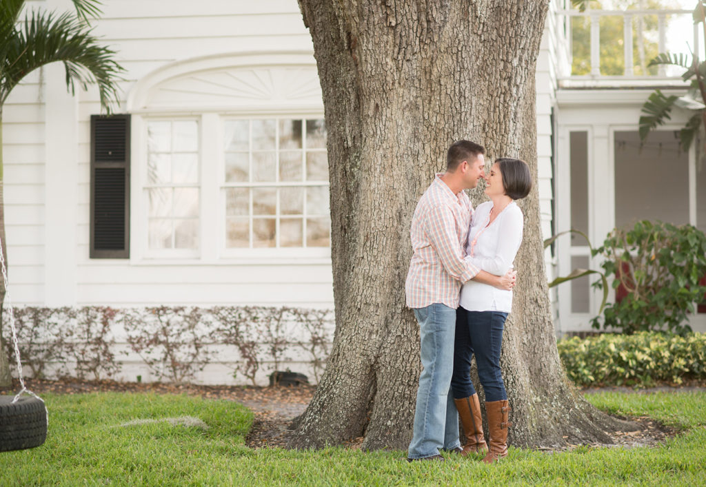 Mikkel Paige Photography engagement photos in downtown Orlando with emotional. The bride and groom chose their home for the quaint session.