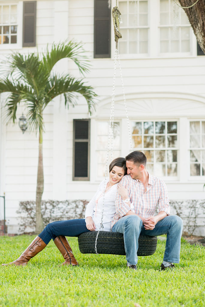Mikkel Paige Photography engagement photos in downtown Orlando with emotional moments of the bride and groom on a tire swing.