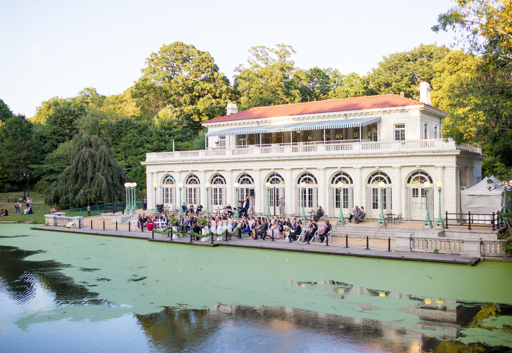 Mikkel Paige Photography photos from a wedding at Prospect Park Boathouse in Brooklyn. The ceremony was held outdoors, lakeside.