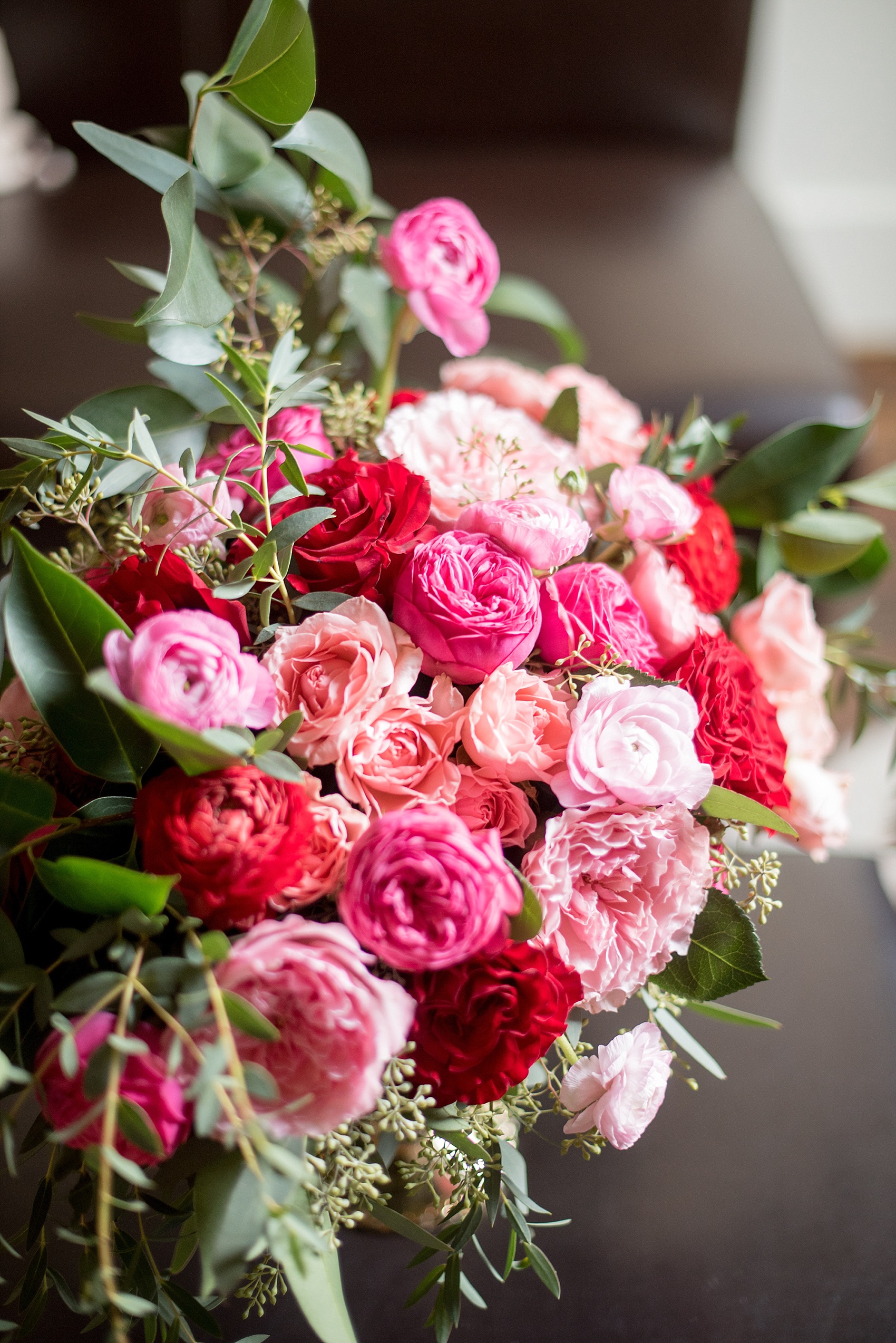 All Saints Chapel Raleigh Bridal Photos with an inspirational tea for Valentine's Day and pink and red flowers by Flower and Flour NC.