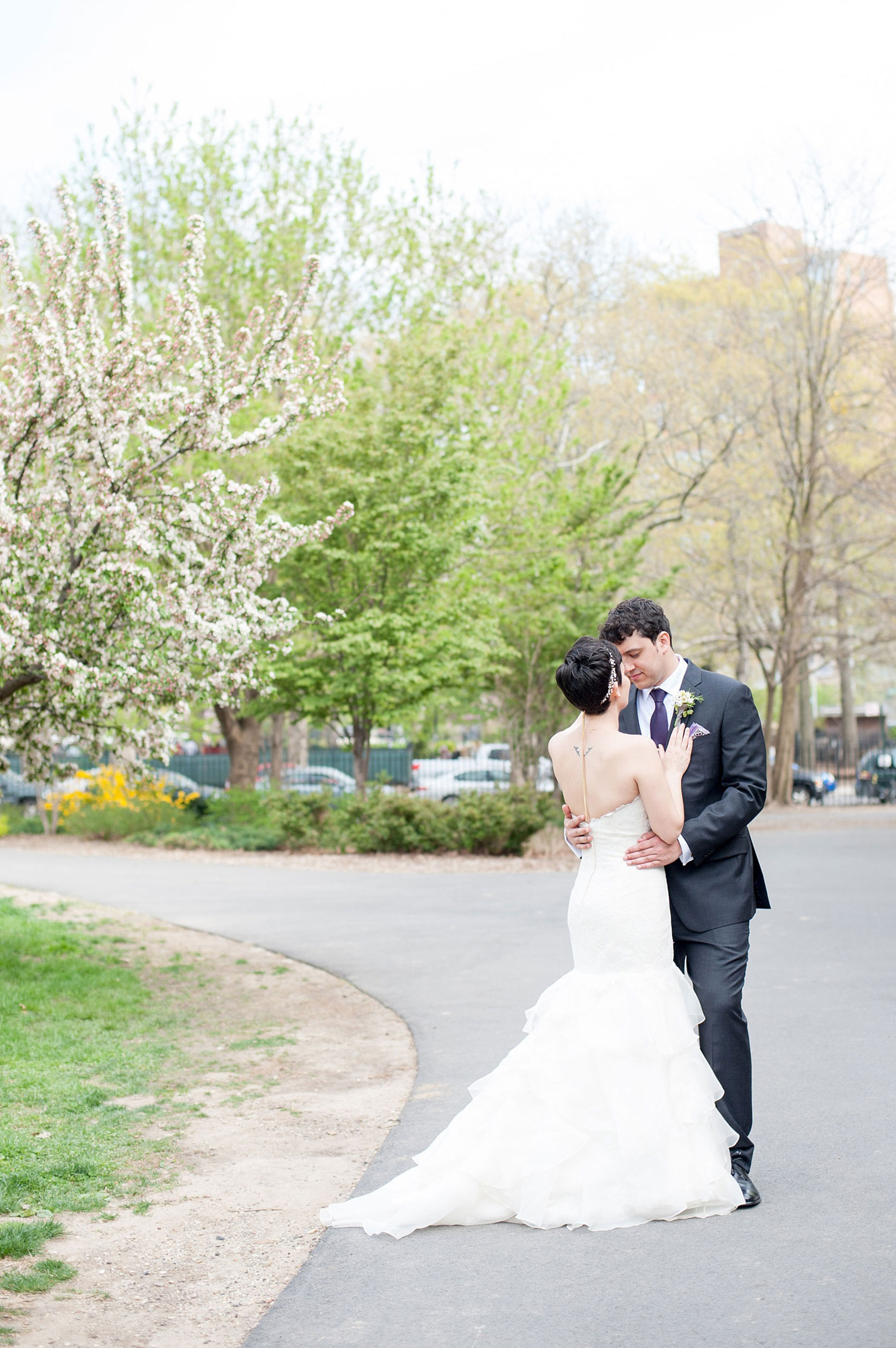 Mikkel Paige Photography Brooklyn Winery wedding photos. Picture of the bride and groom near spring cherry blossom trees.