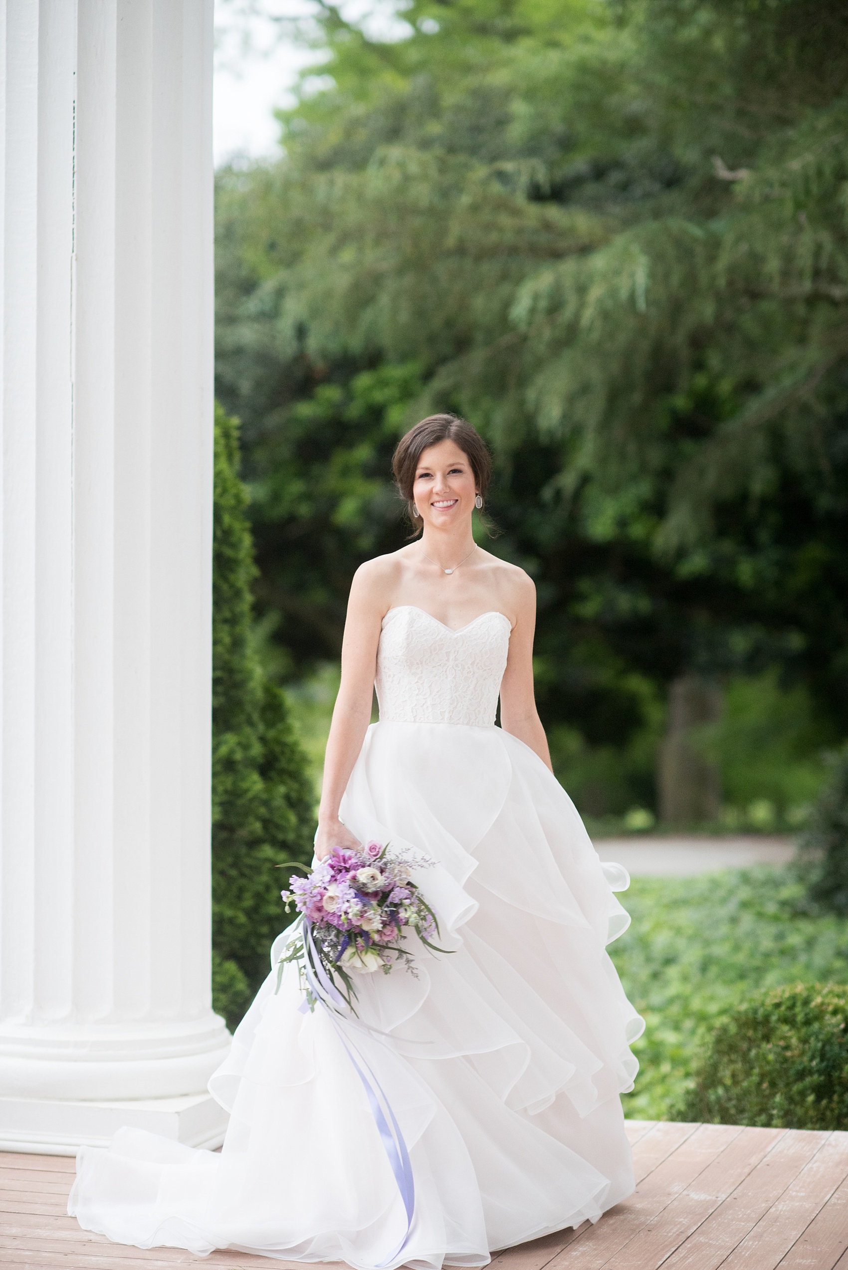Mikkel Paige Photography images of a Rose Hill Plantation wedding inspiration. Photos of the bride in a strapless gown with lace and organza.
