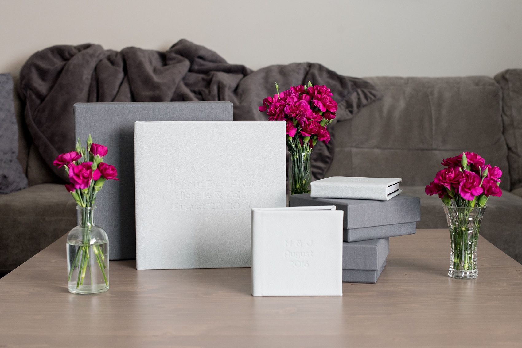 Wedding albums by Mikkel Paige Photography. Mist Leather Signature Album with matching parent albums for a wedding at India House, NYC.