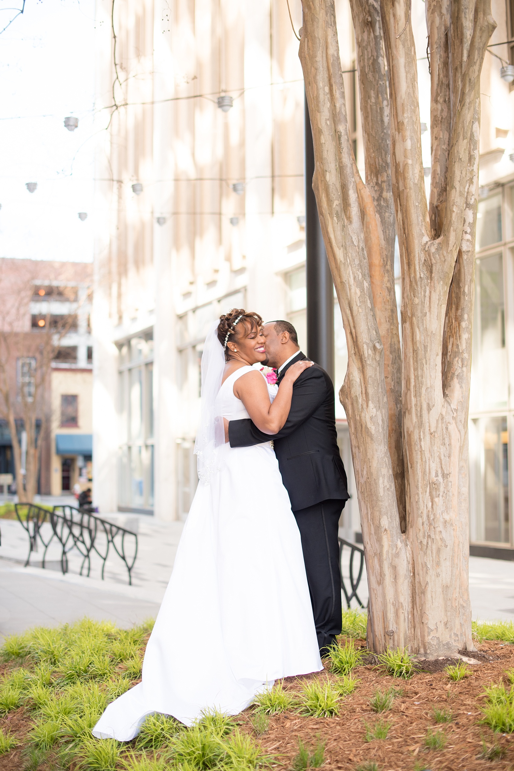 Mikkel Paige Photography photos of a small wedding at The Stockroom at 230 and The Glass Box in downtown Raleigh, North Carolina.