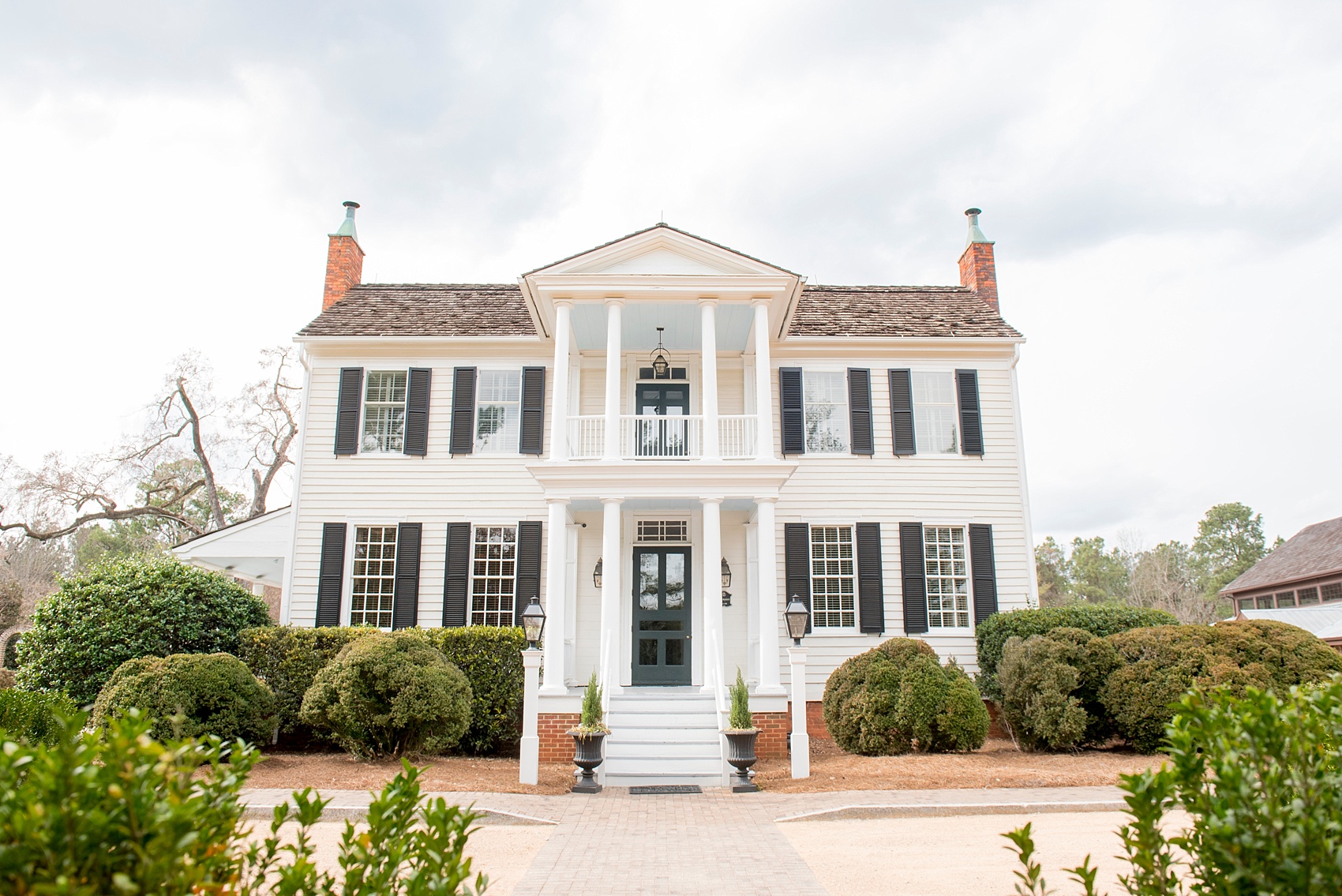 The Sutherland Wedding Photos by Mikkel Paige Photography. Picture of the classic white southern manor home. Planning by A Southern Soiree.