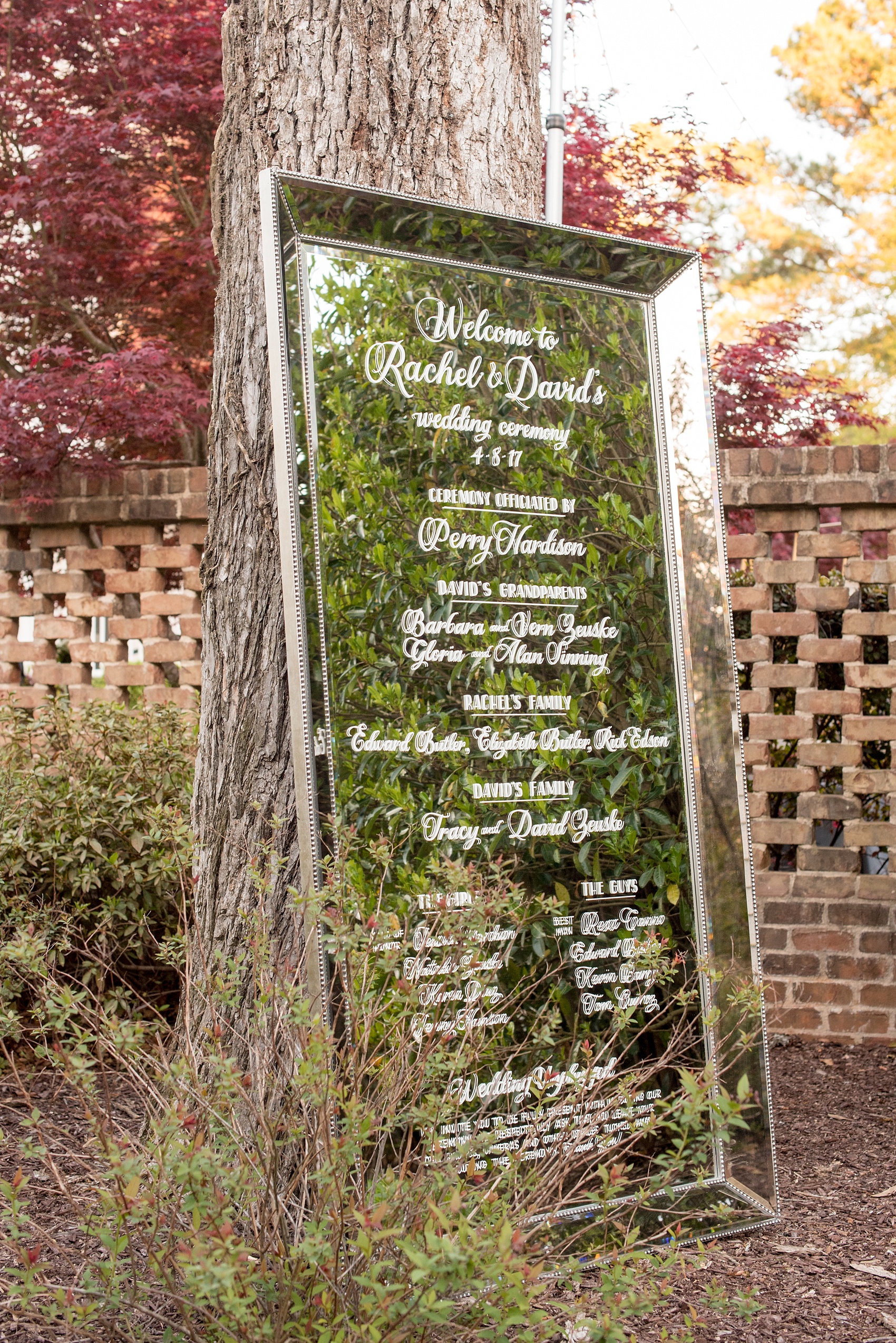 The Sutherland Wedding Photos by Mikkel Paige Photography. Mirror ceremony program signage by ThemeWorks and planning by A Southern Soiree.