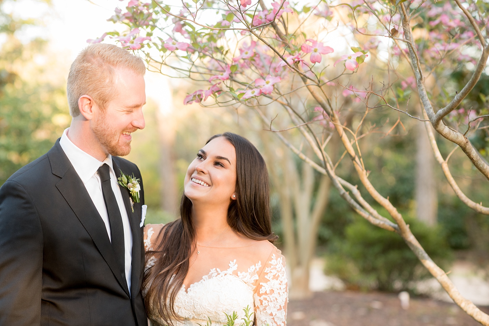 The Sutherland Wedding Photos by Mikkel Paige Photography. Bride and groom picture with a lace Pronovias gown and classic black tuxedo. Planning by A Southern Soiree.