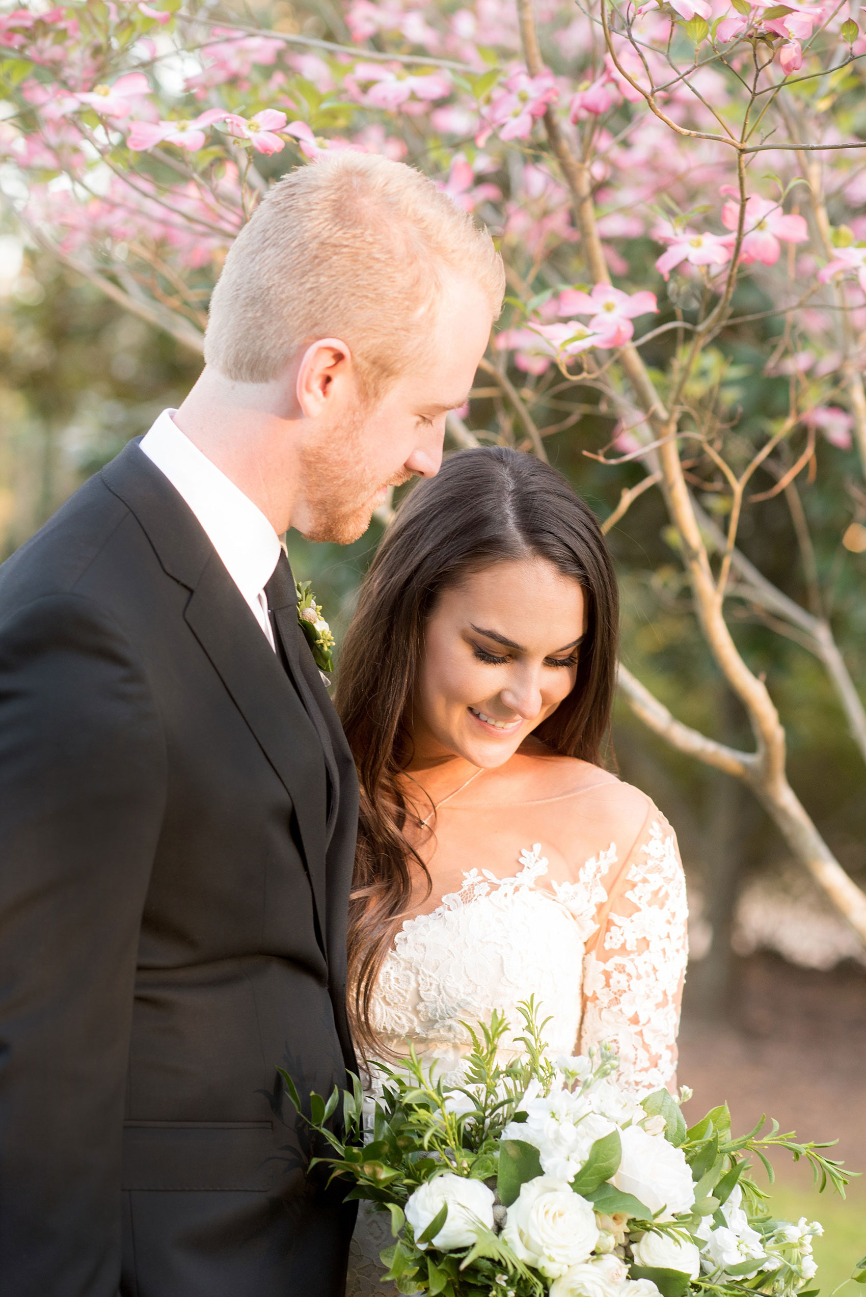 The Sutherland Wedding Photos by Mikkel Paige Photography. Bride and groom picture with a lace Pronovias gown and classic black tuxedo. Planning by A Southern Soiree.