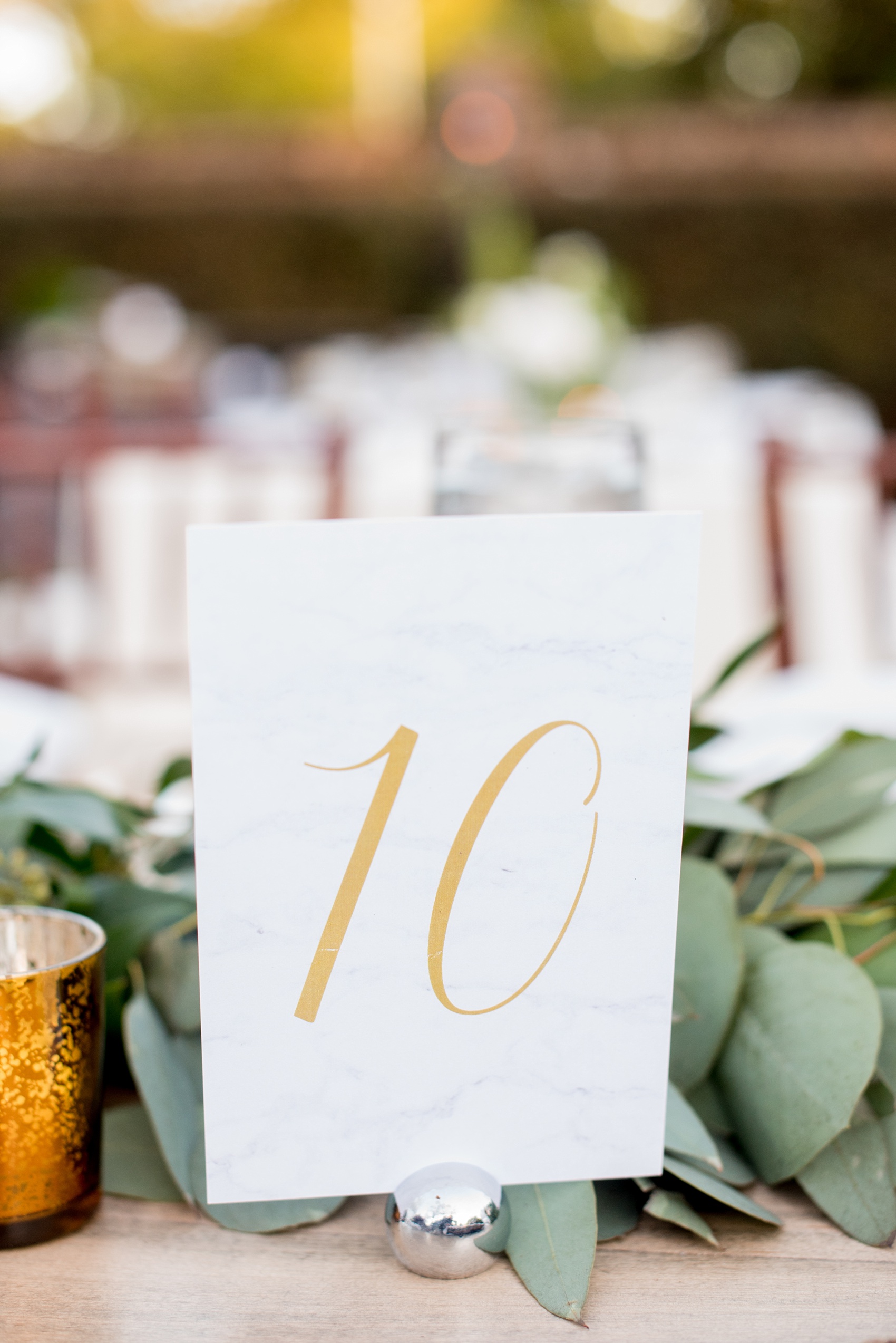 The Sutherland Wedding Photos by Mikkel Paige Photography. Table numbers to match marble invitation suites. Planning by A Southern Soiree.