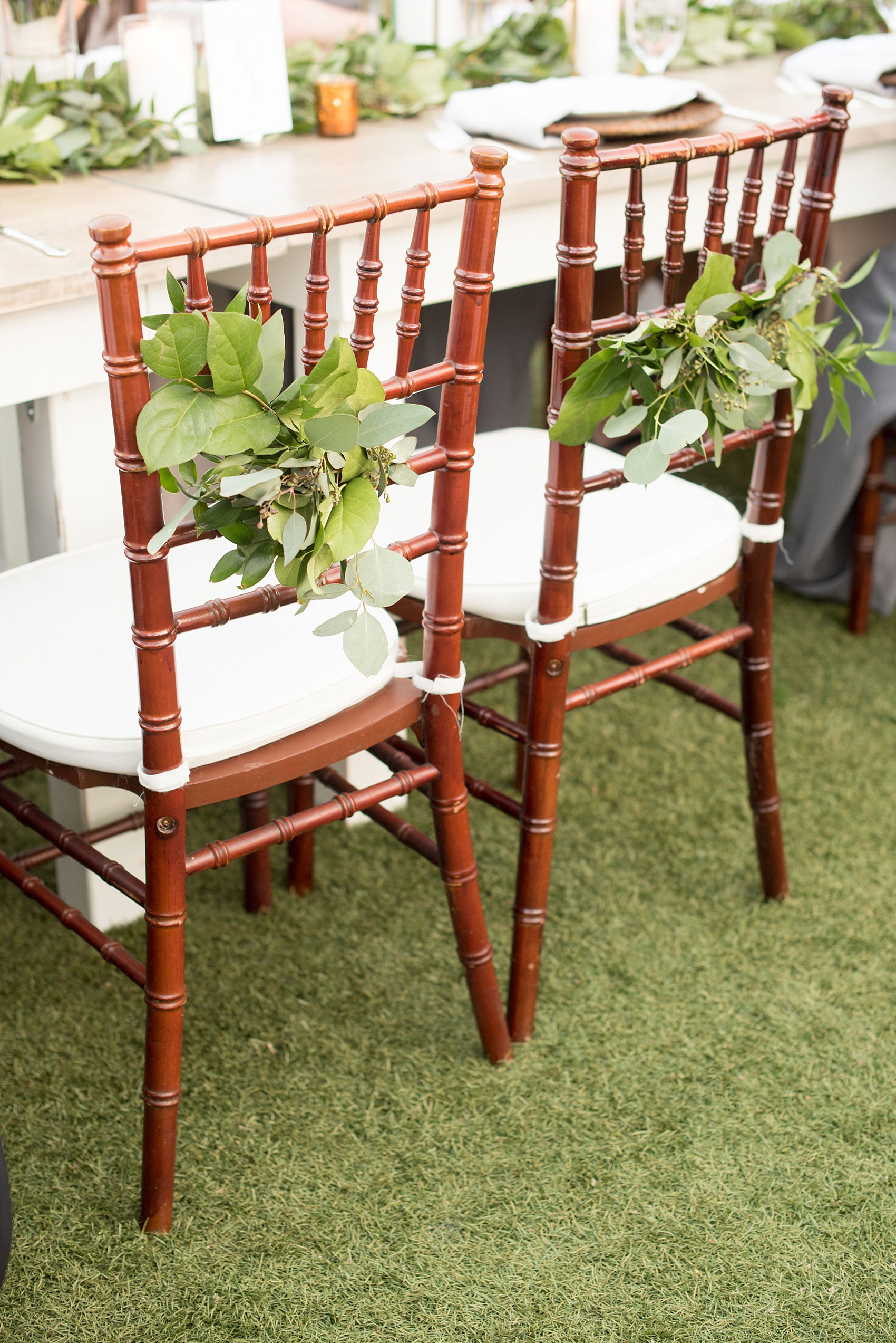 The Sutherland Wedding Photos by Mikkel Paige Photography. Eucalyptus flower chair detail for the bride and groom.