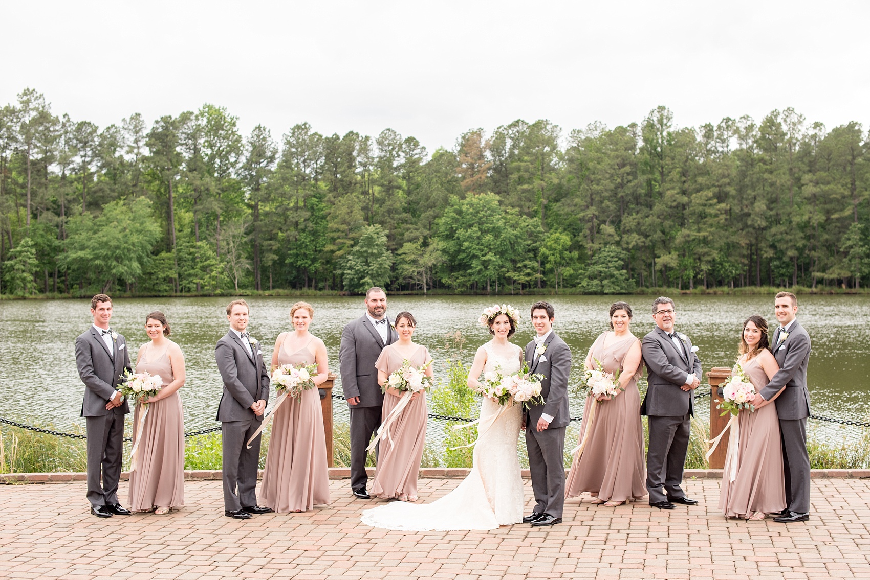 The Pavilions at Angus Barn wedding photos by Mikkel Paige Photography. Flowers by Meristem Floral with bridesmaids in mauve, dusty rose gowns.