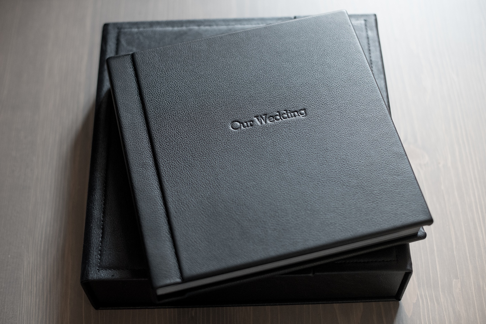 Black leather wedding album by Mikkel Paige Photography of an event at Tribeca Rooftop in NYC. 