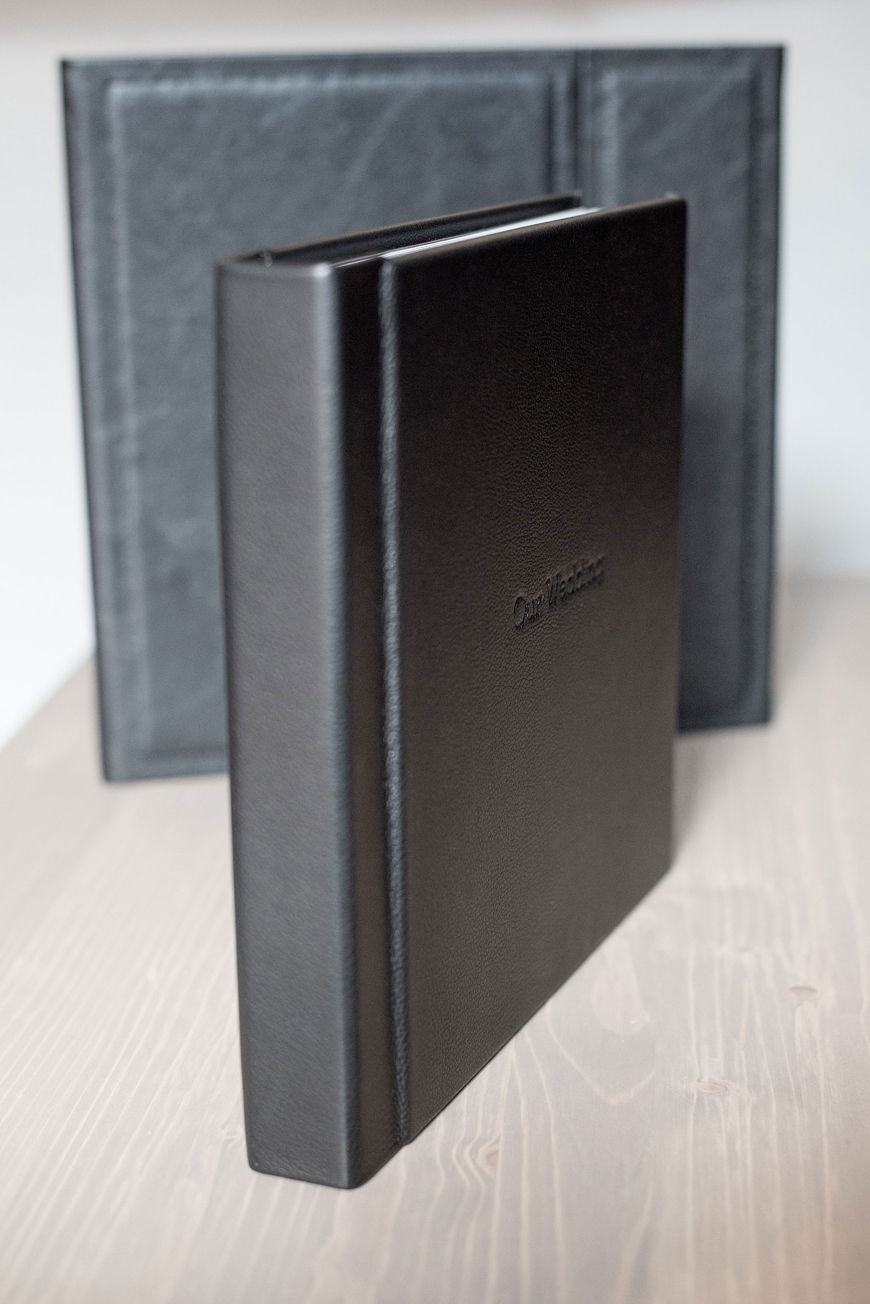 Black leather wedding album by Mikkel Paige Photography of an event at Tribeca Rooftop in NYC. 