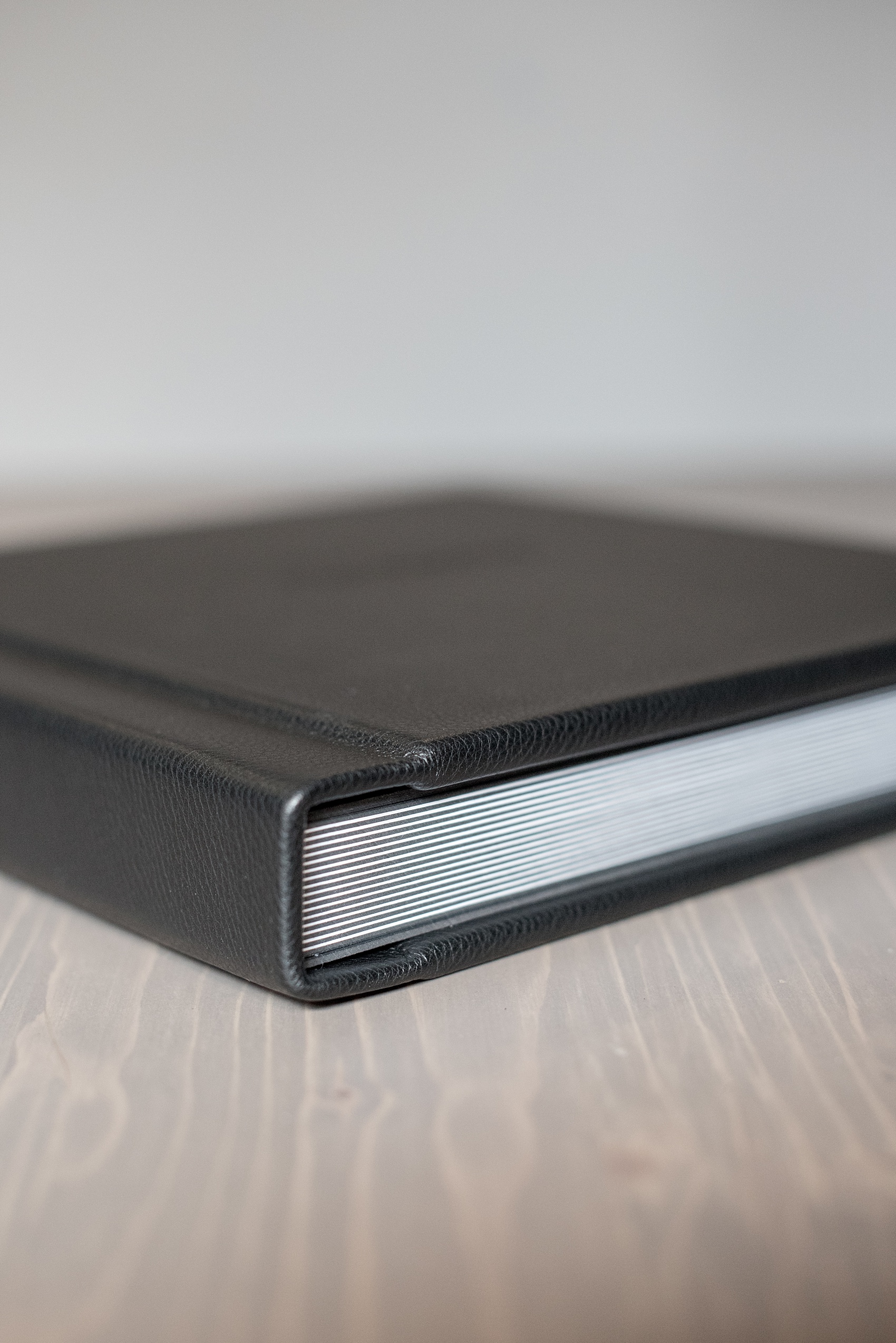 Black leather wedding album by Mikkel Paige Photography of an event at Tribeca Rooftop in NYC. 