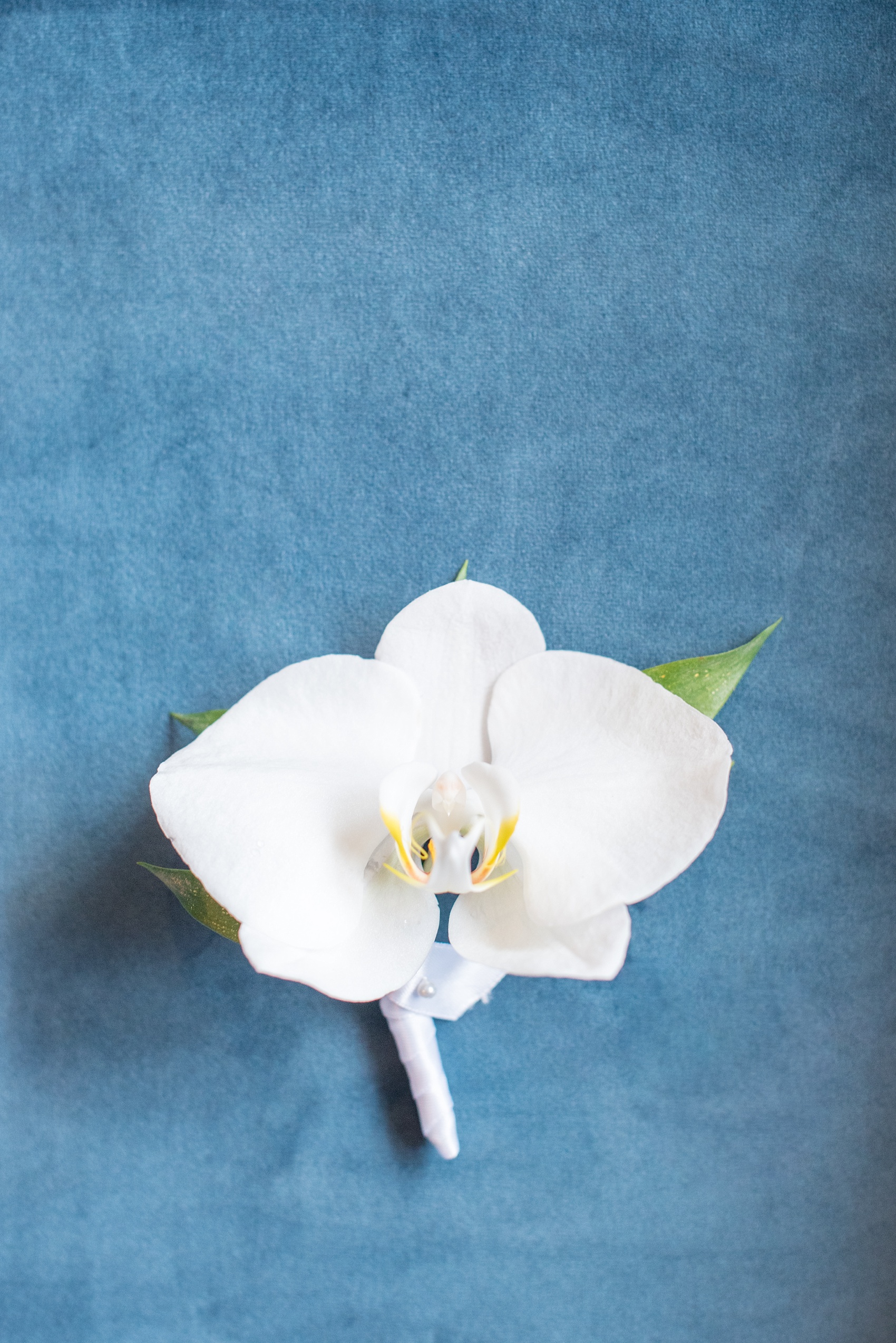 The Cookery Durham wedding photos by Mikkel Paige Photography. Picture of the white orchid boutonniere by Tre Bella.