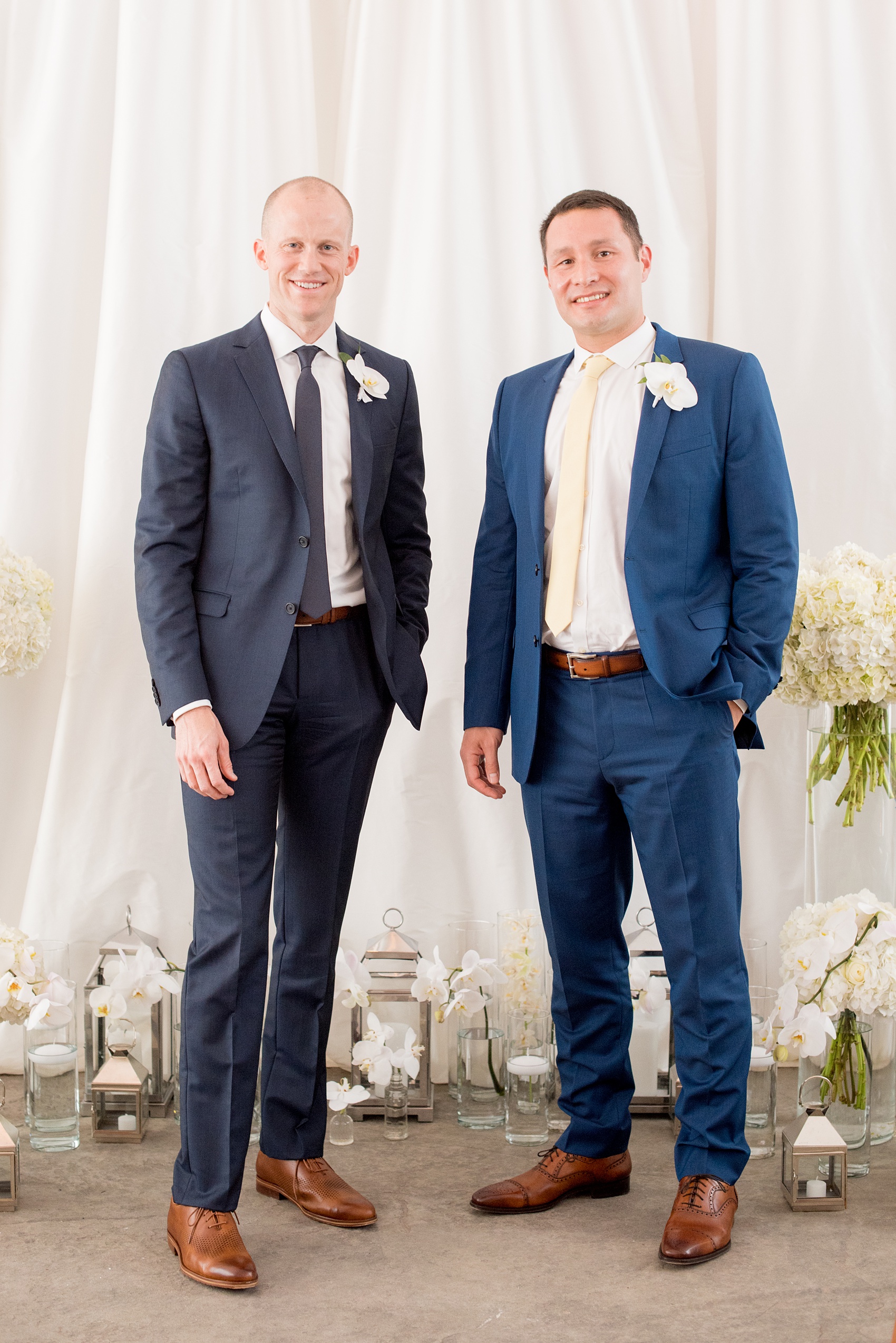 The Cookery Durham wedding photos by Mikkel Paige Photography. Picture of the groomsman and best man in a blue suit, yellow tie and white orchid boutonniere by Tre Bella. Planning by Erin McLean Events.
