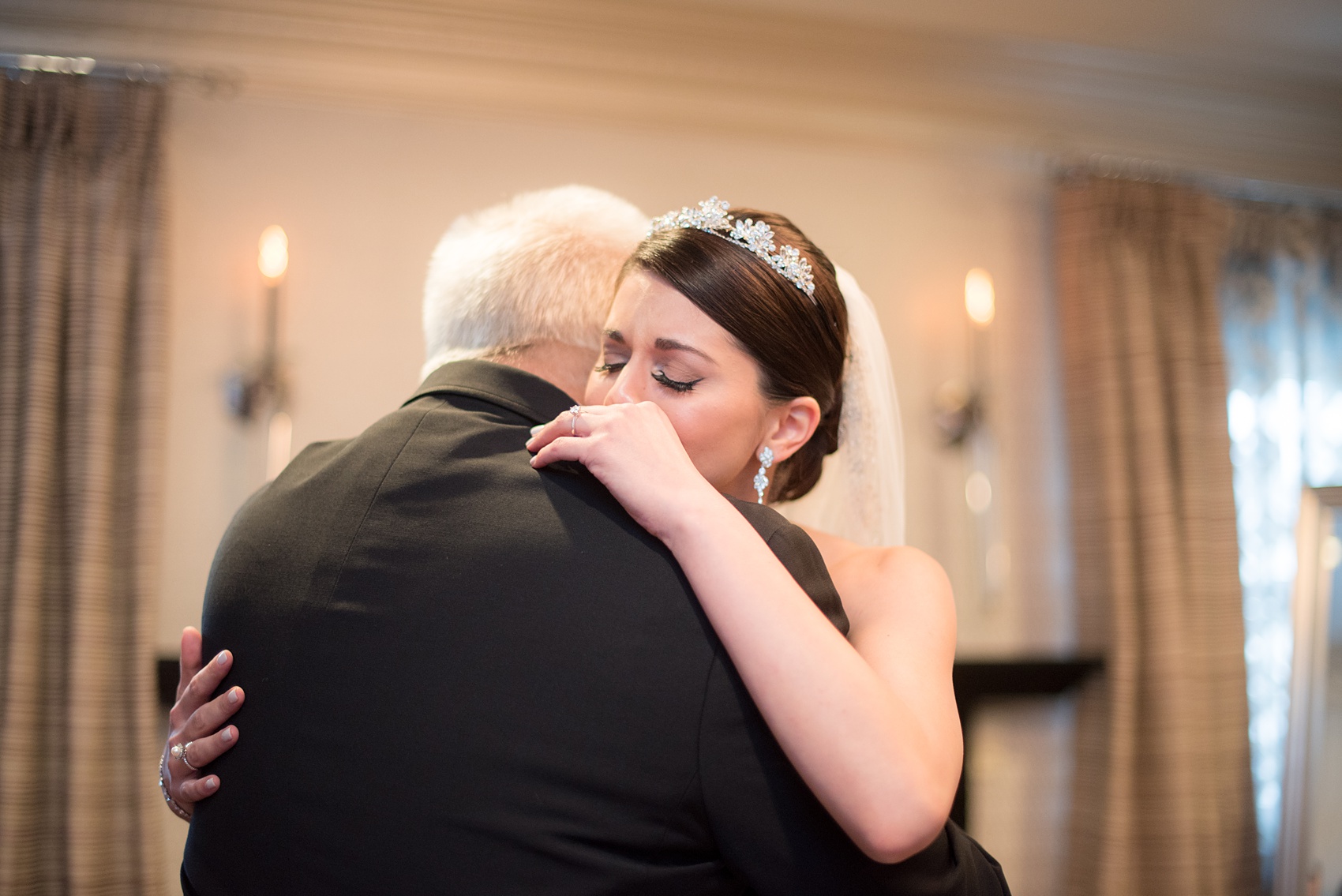 Mikkel Paige Photography wedding photos at The Fox Hollow, Long Island. A picture of the bride's emotional first look with her father.