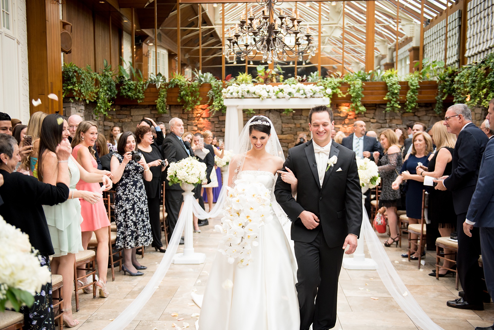 Mikkel Paige Photography wedding photos at The Fox Hollow, Long Island. Picture of the bride and groom at the ceremony.