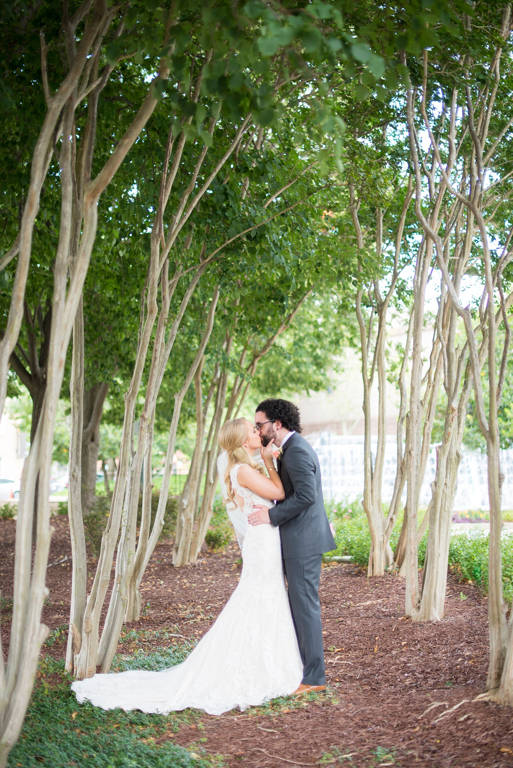 The Rickhouse Durham wedding photos by Mikkel Paige Photography. North Carolina celebration with a photo of the bride and groom downtown.