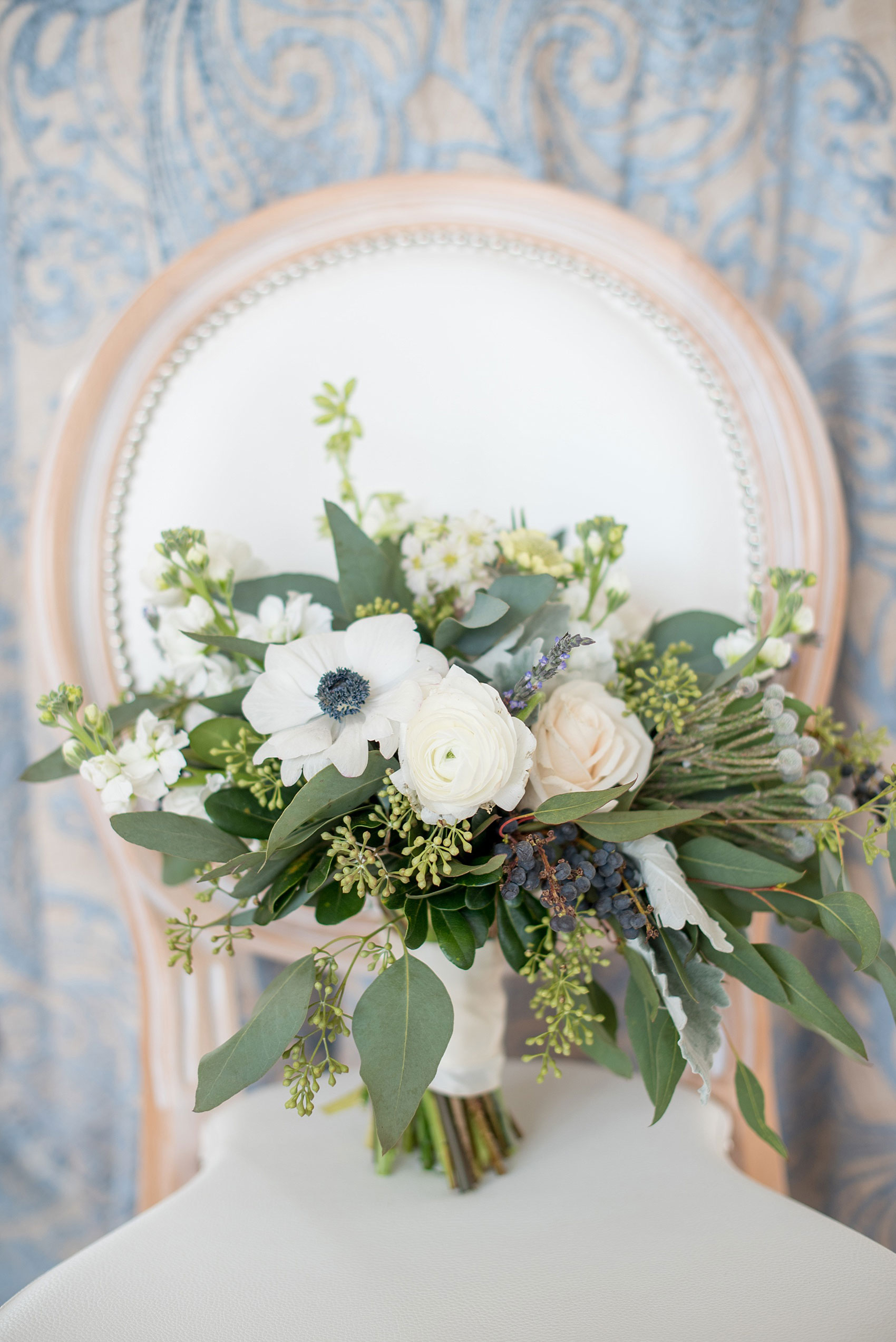 The Glass Box Raleigh wedding photos by Mikkel Paige Photography. Picture of a white bouquet with eucalyptus, anemones and lavender by Tre Bella.