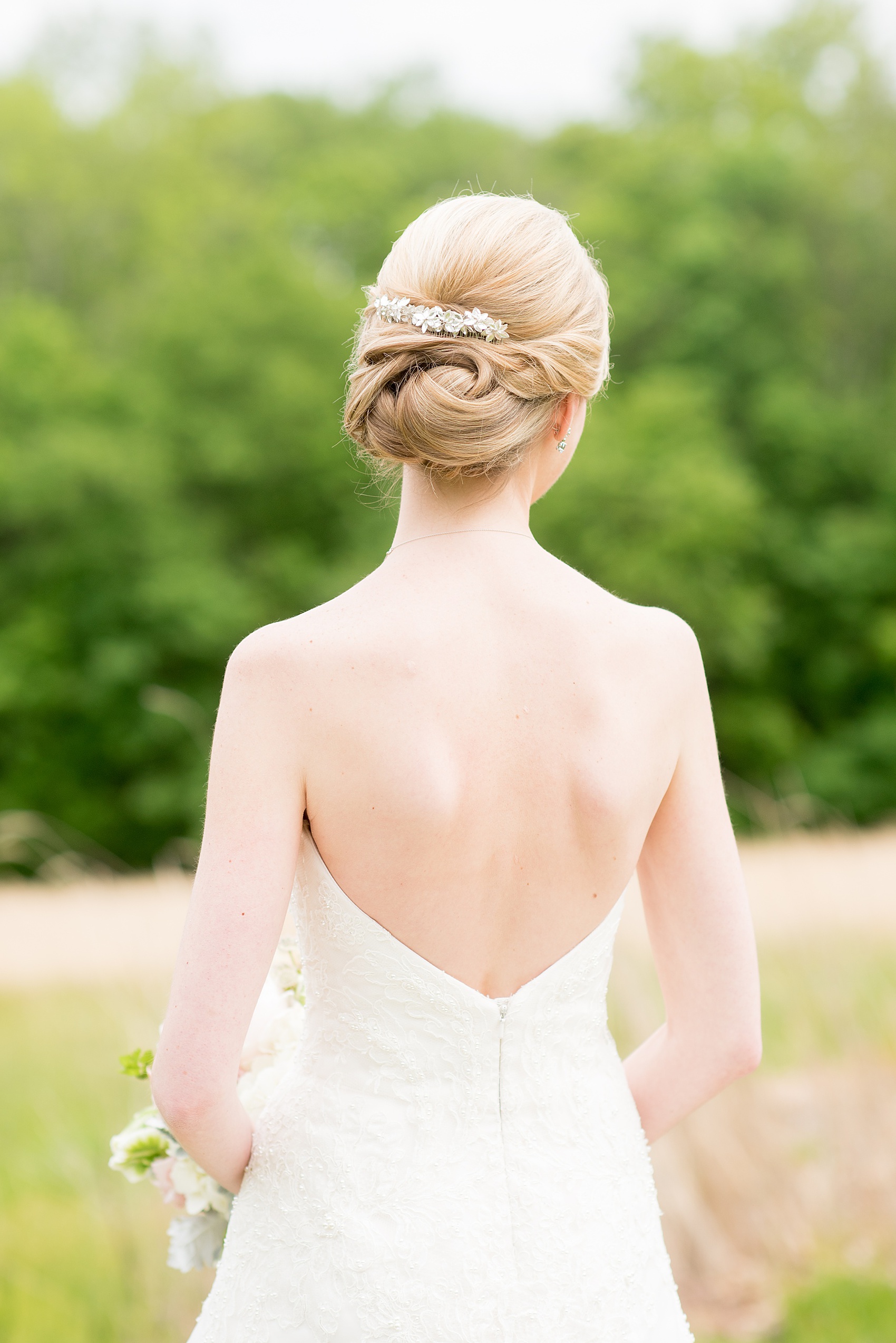 Waveny House wedding photos in Connecticut by Mikkel Paige Photography. Picture of the bride's hair, all up with a decorative rhinestone comb.