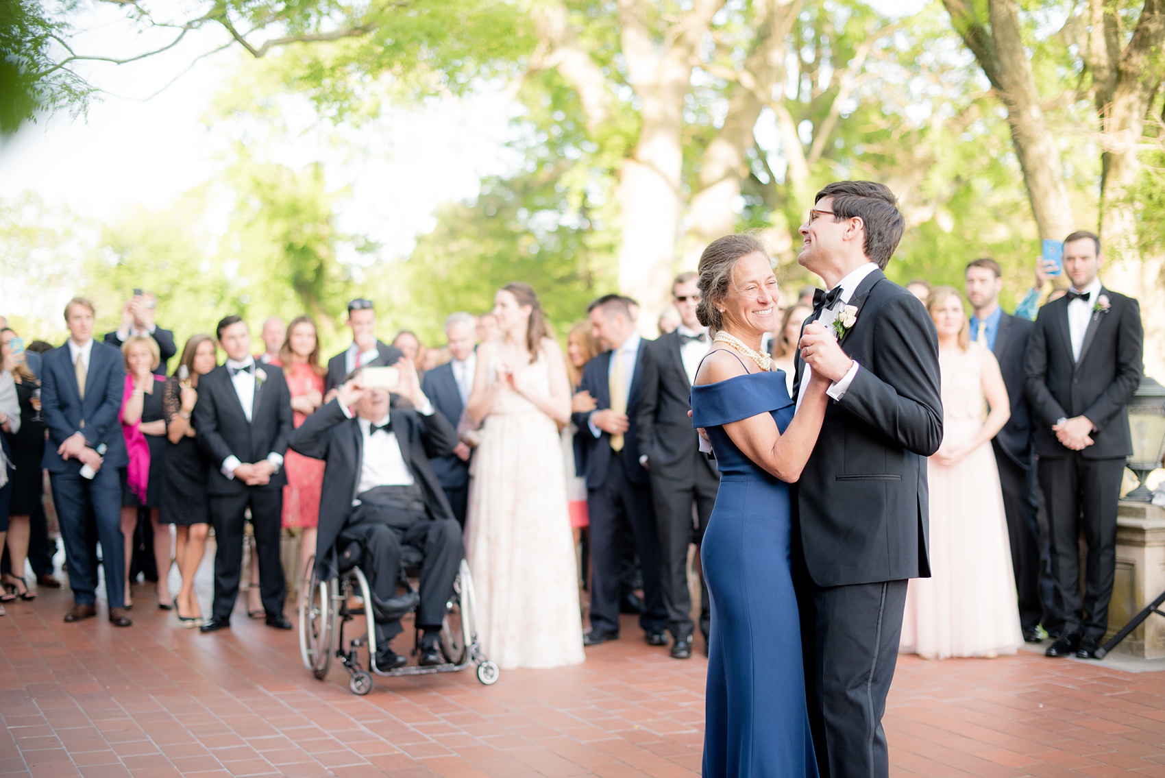 Waveny House wedding photos in Connecticut by Mikkel Paige Photography. Picture of the groom dancing with his mother.