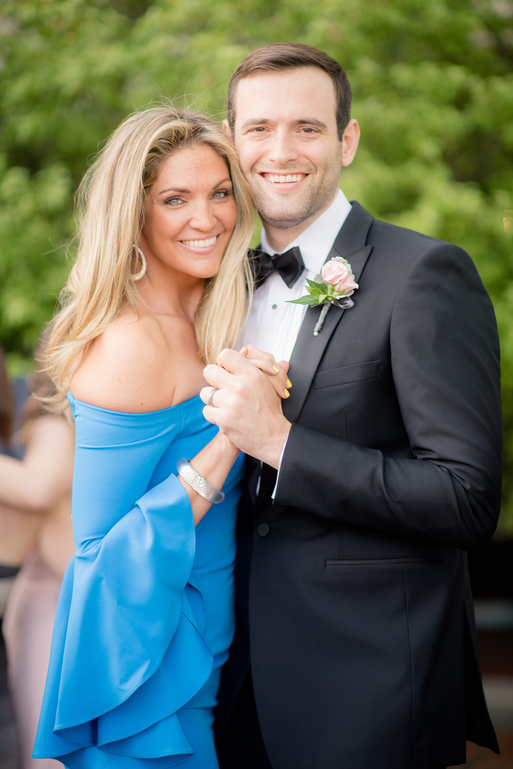 Waveny House wedding photos in Connecticut by Mikkel Paige Photography. Picture of a groomsman and his wife at the reception.