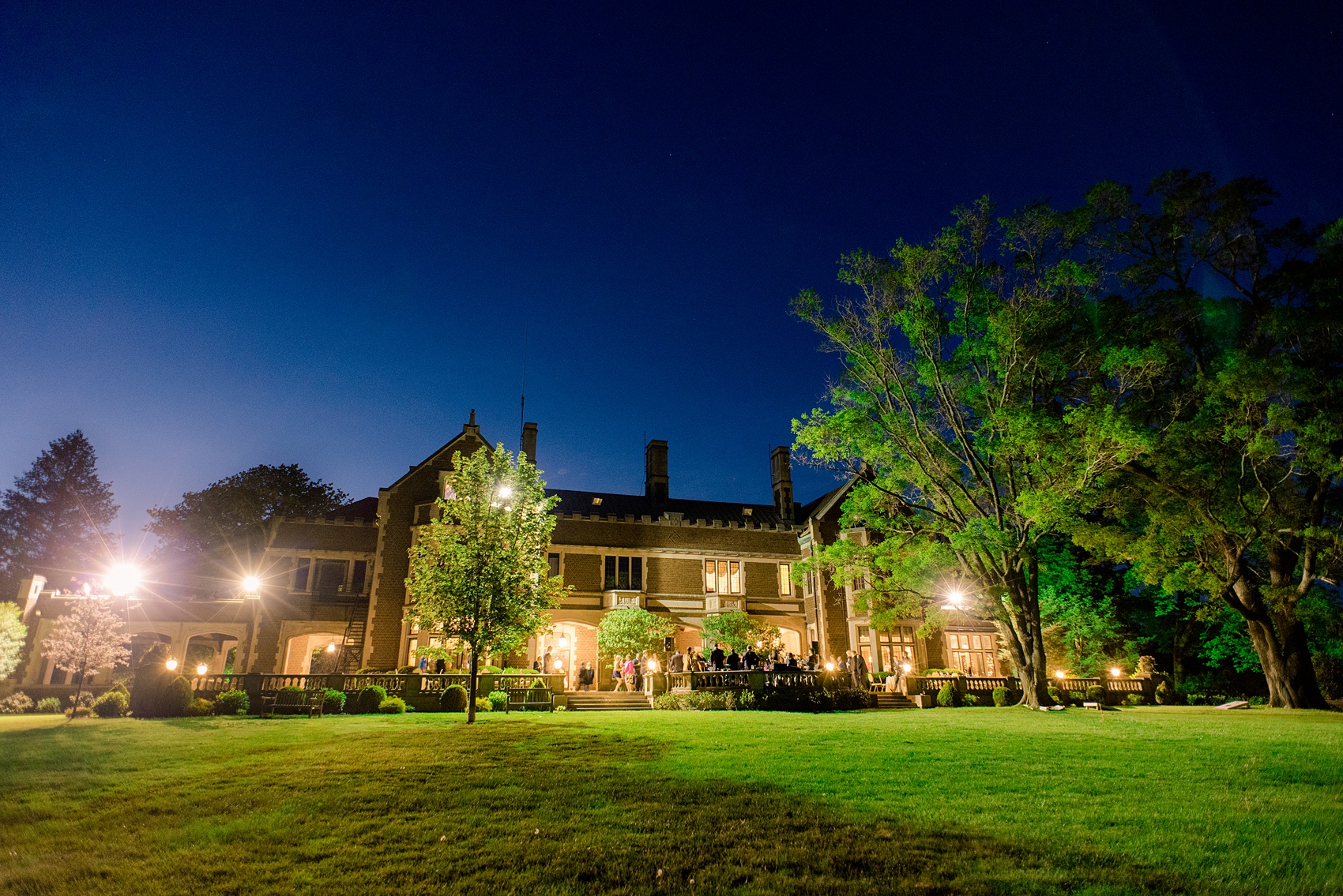 Waveny House wedding photos in Connecticut by Mikkel Paige Photography. Night picture of the venue in the park.