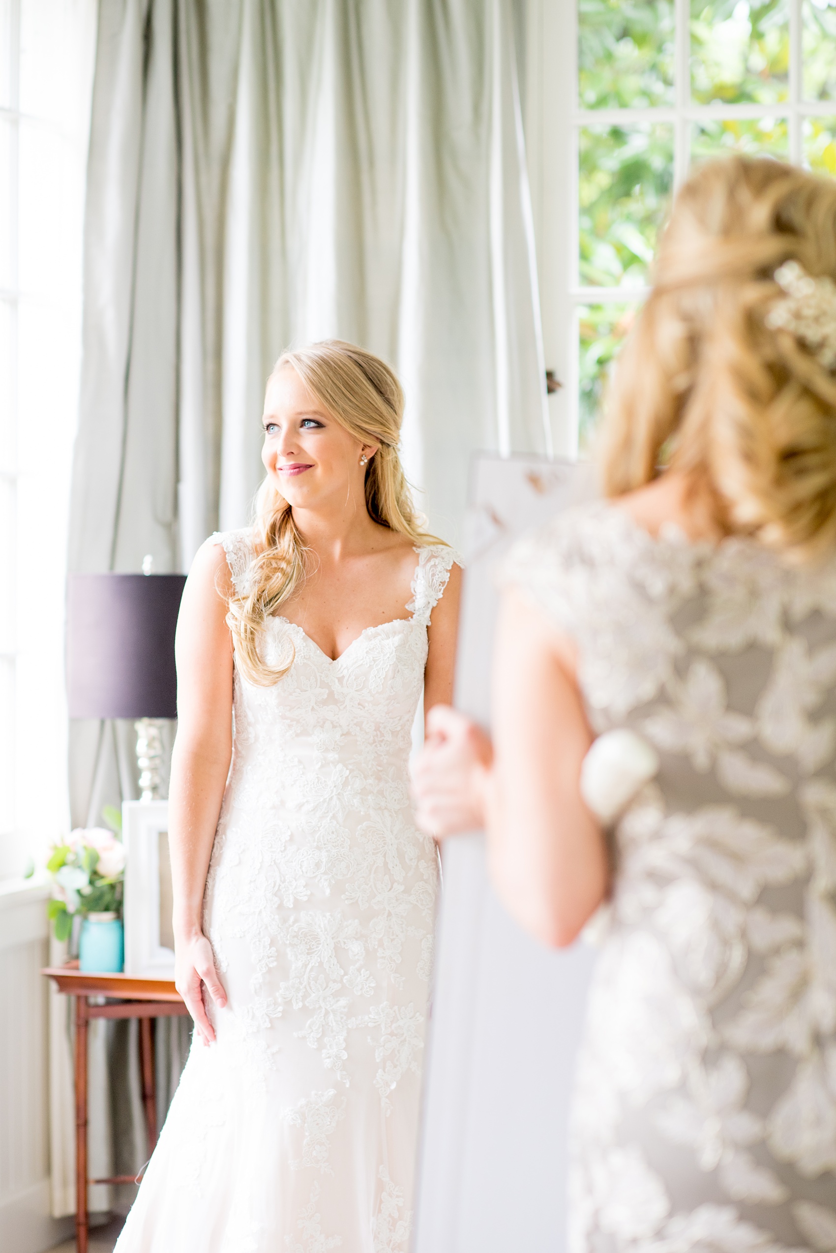 Mikkel Paige Photography photos from getting ready photos in Durham, North Carolina. Picture of the bride getting ready at a suite in King's Daughters Inn.