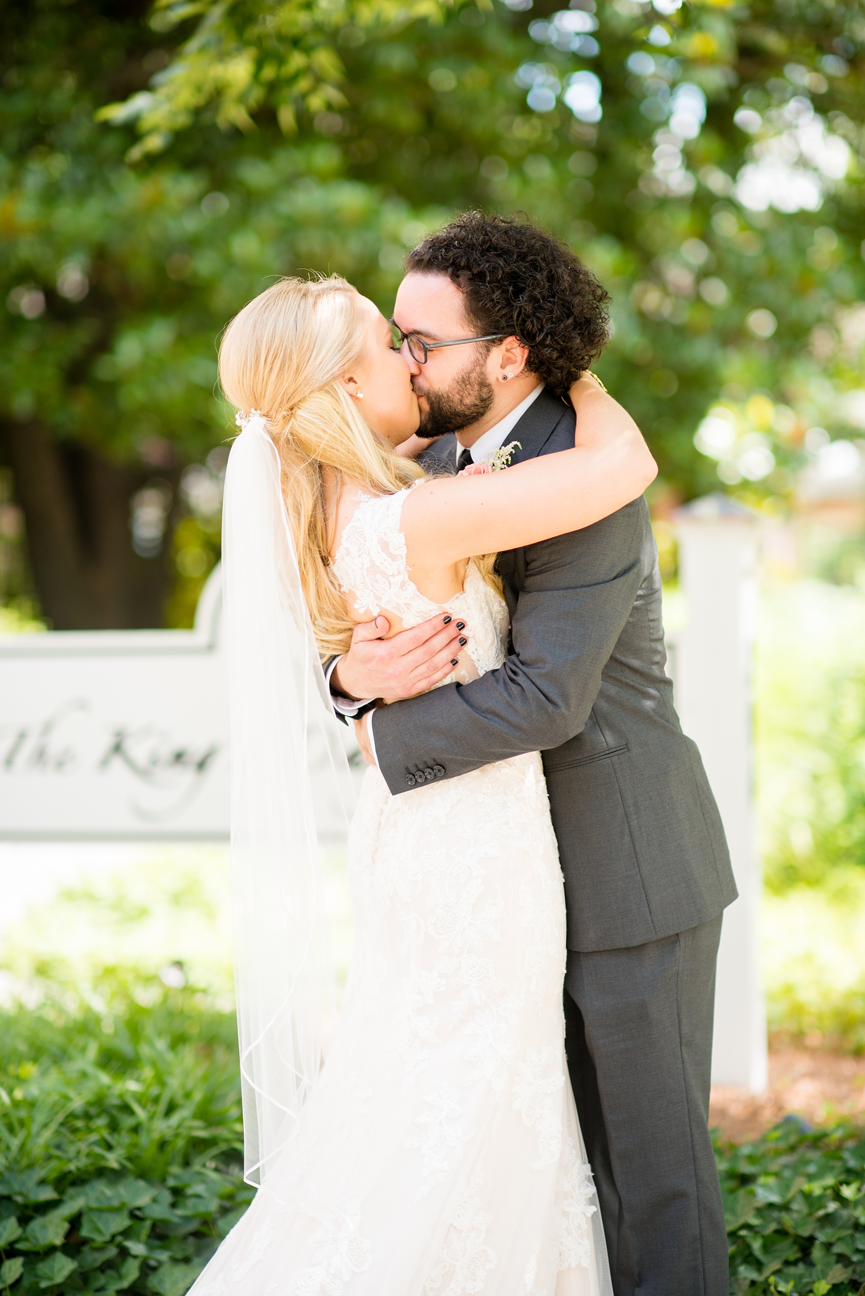 Mikkel Paige Photography photos from a wedding in Durham, North Carolina. Picture of the bride and groom after their first look at the King's Daughters Inn.