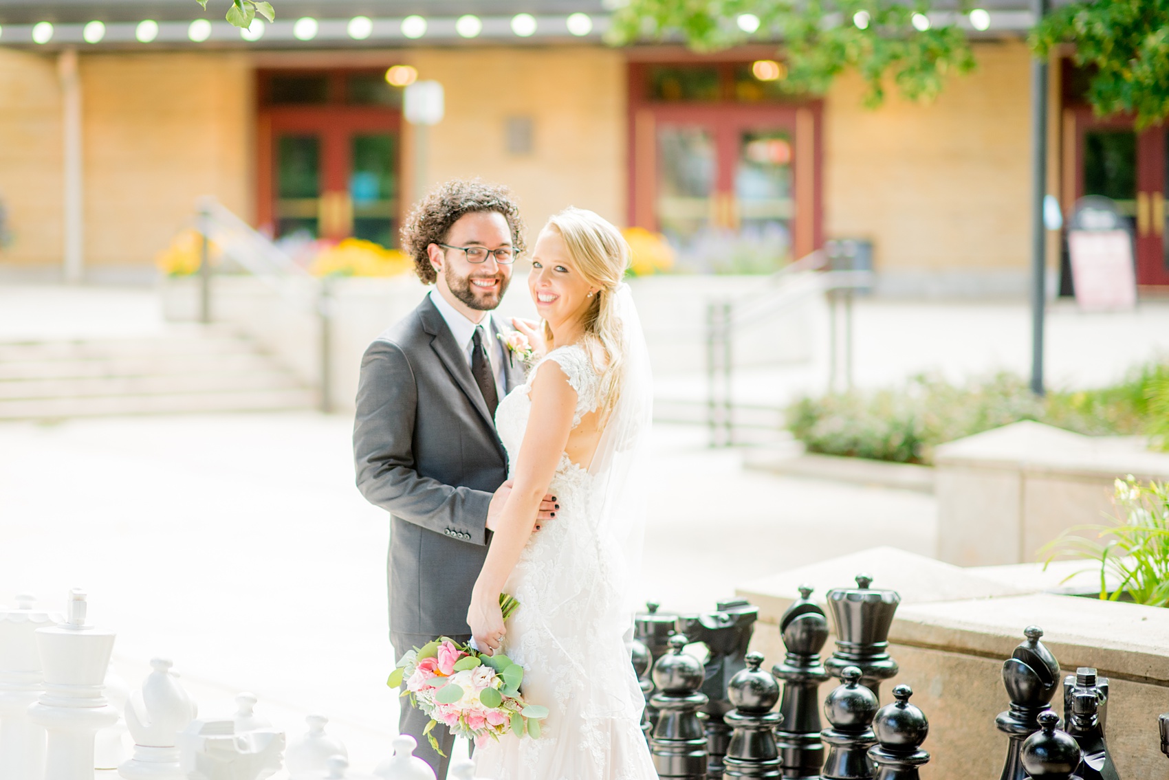 Mikkel Paige Photography photos from a wedding in Durham, North Carolina. Picture of the bride and groom on a giant chess board.