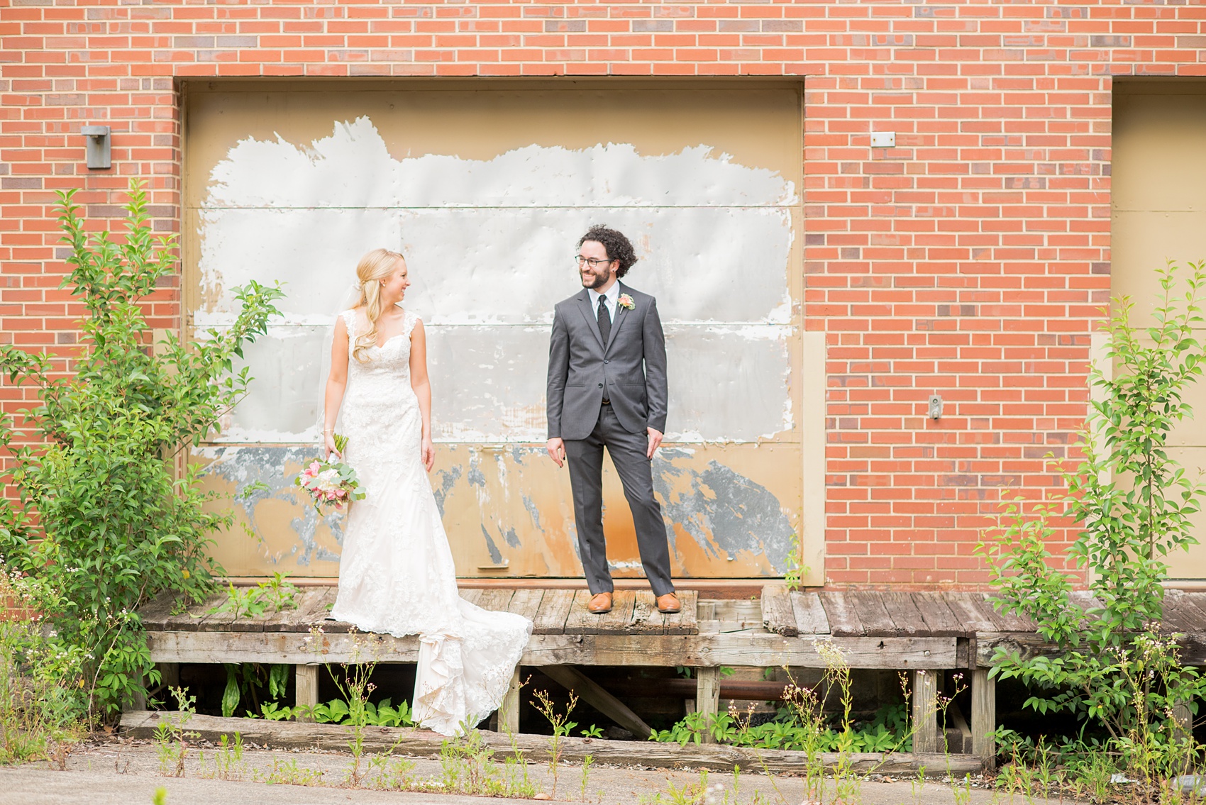 Mikkel Paige Photography photos from a wedding in Durham, North Carolina. Picture of the bride and groom in an urban, rustic setting.