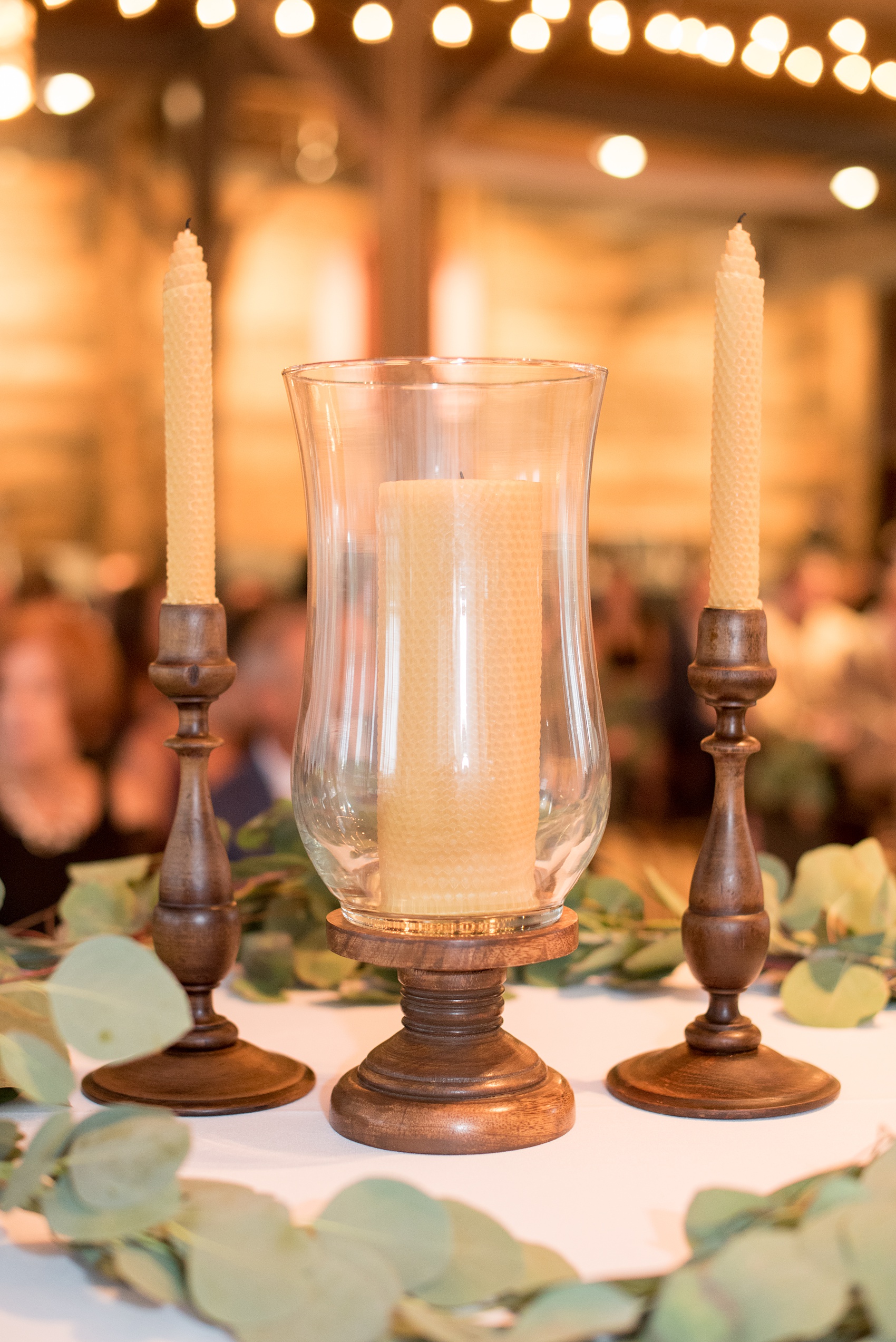 Mikkel Paige Photography photos from a wedding at The Rickhouse in Durham, North Carolina. Picture of beeswax unity candles.