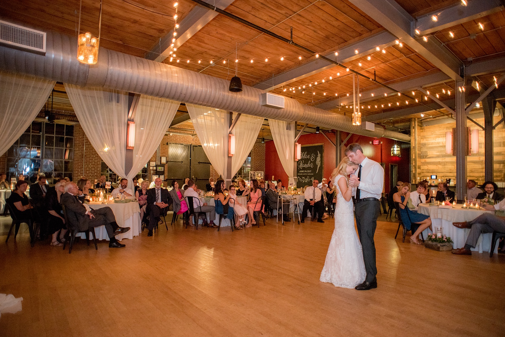 Mikkel Paige Photography photos from a wedding at The Rickhouse in Durham, North Carolina. Picture of the bride's dance with her father.