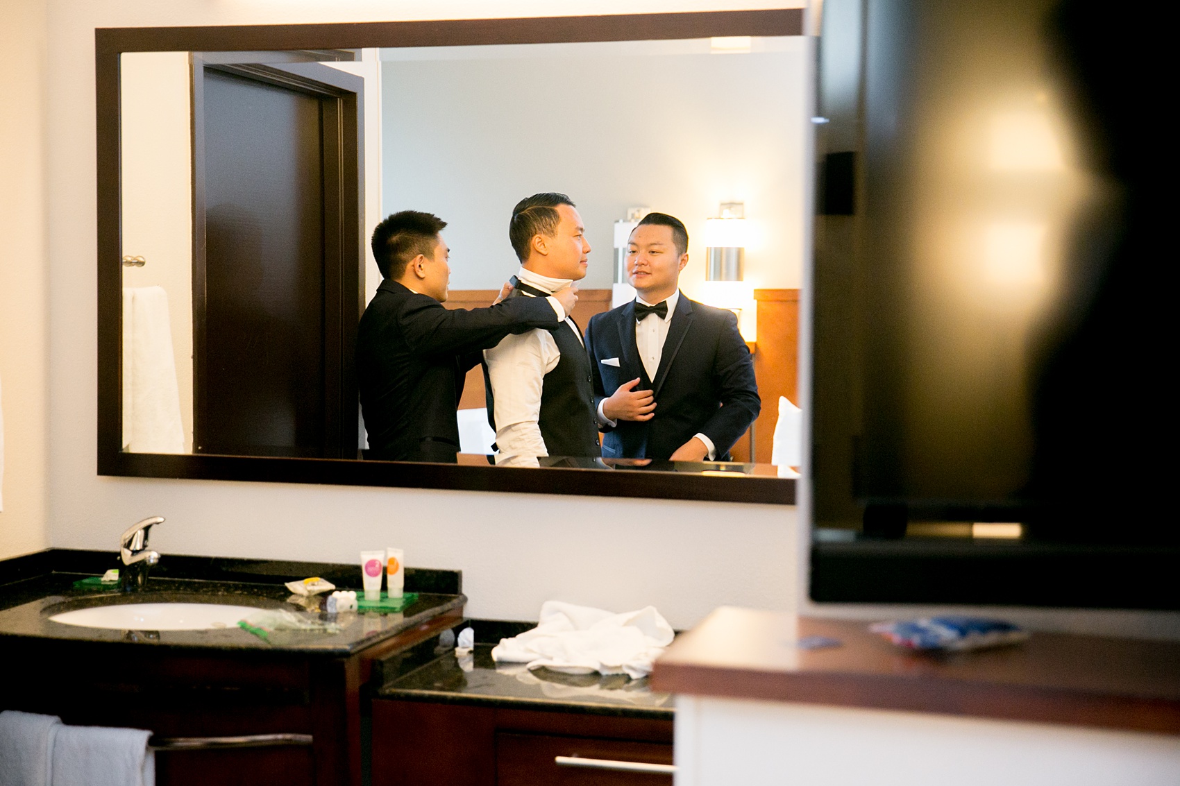 Mikkel Paige Photography pictures of a Westbury Manor wedding on Long Island. Detail photo the groom getting ready.