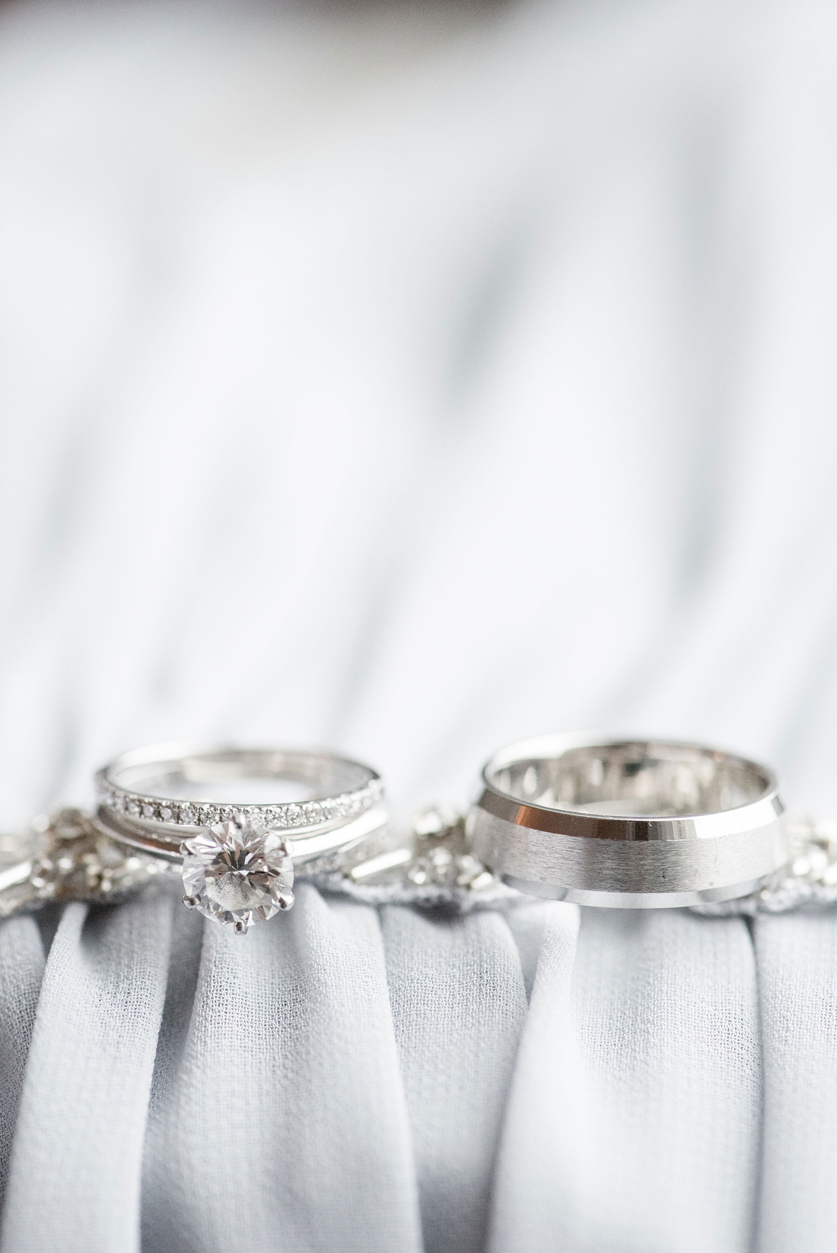 Mikkel Paige Photography pictures of a Westbury Manor wedding on Long Island. Detail photo the bride and groom's rings.