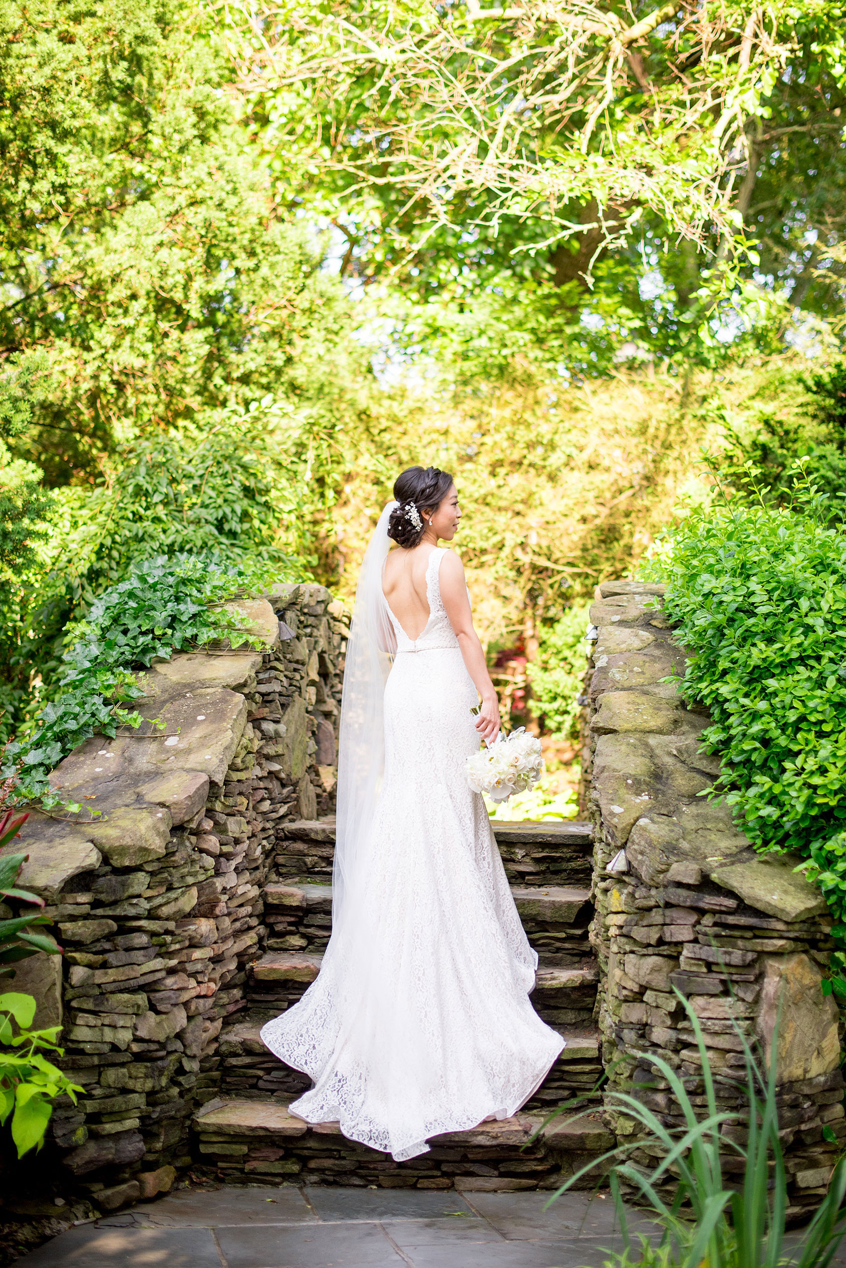 Mikkel Paige Photography pictures of a Westbury Manor wedding on Long Island. Photo of the bride in her lace Mikaella Bridal wedding gown.