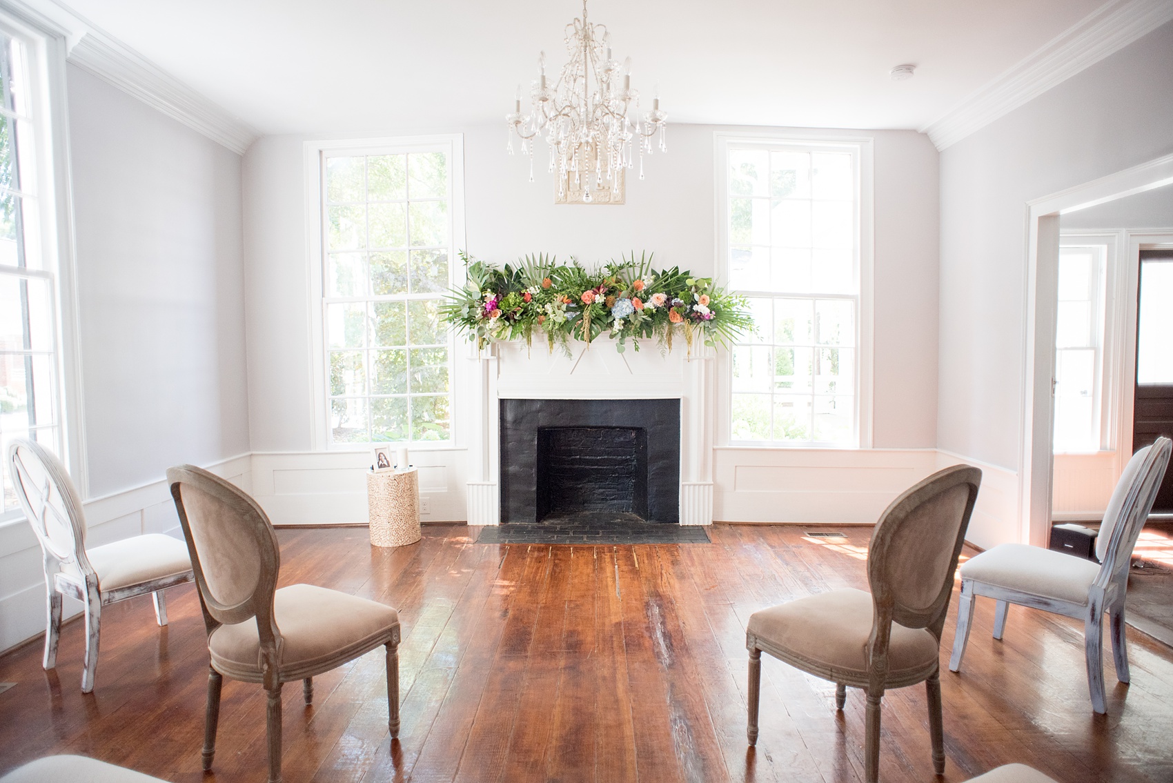 Mikkel Paige Photography pictures of a wedding at Leslie-Alford Mim's House in North Carolina for a Mad Dash Weddings event. Photo of the small elopement ceremony setup inside the historic home.